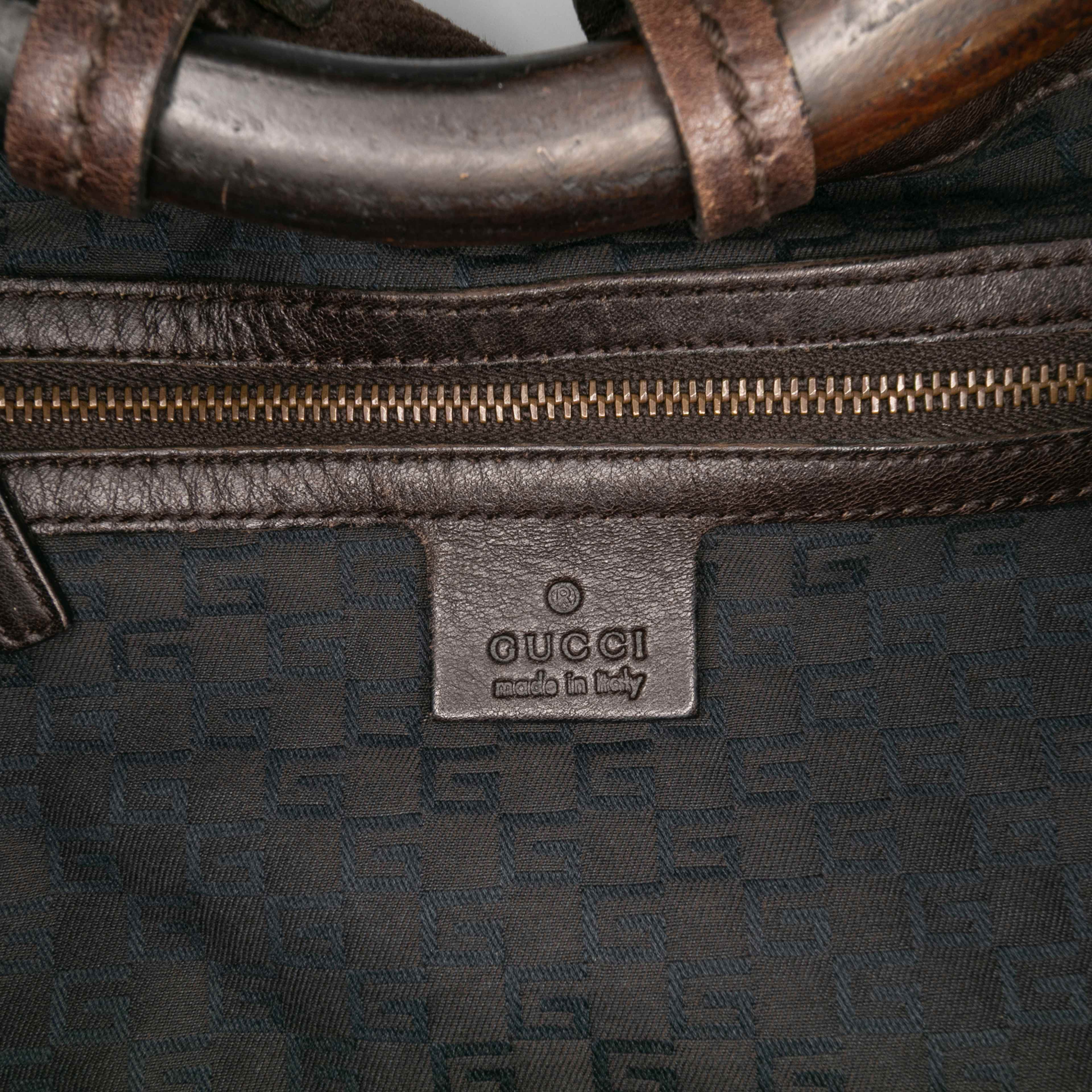Gucci Canvas Ring Top Handle Bag, från Luxclusif, i färgen dark brown. Klicka för att öppna bilden i stort format