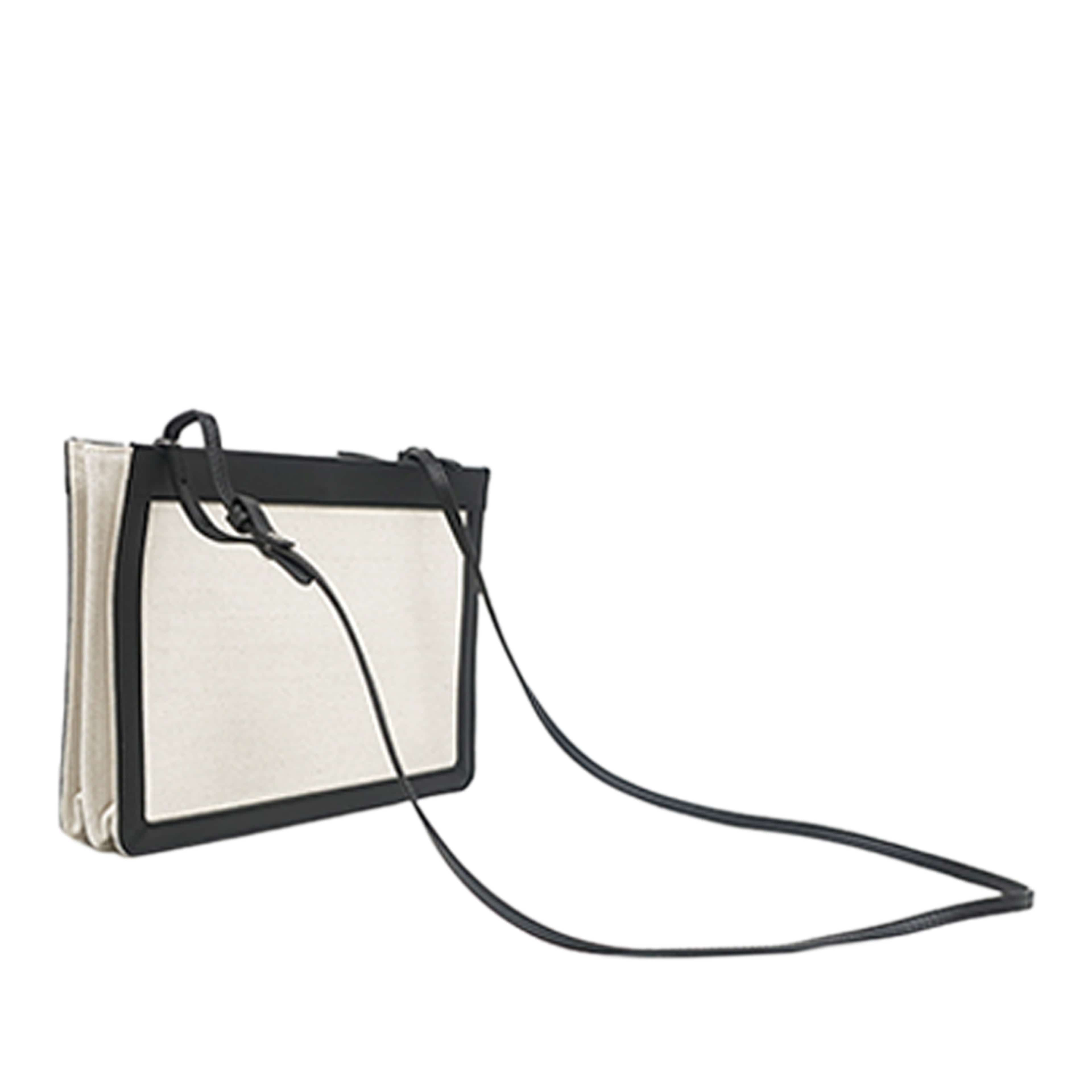 Balenciaga Canvas Navy Pochette Crossbody, från Luxclusif, i färgen brun. Klicka för att öppna bilden i stort format