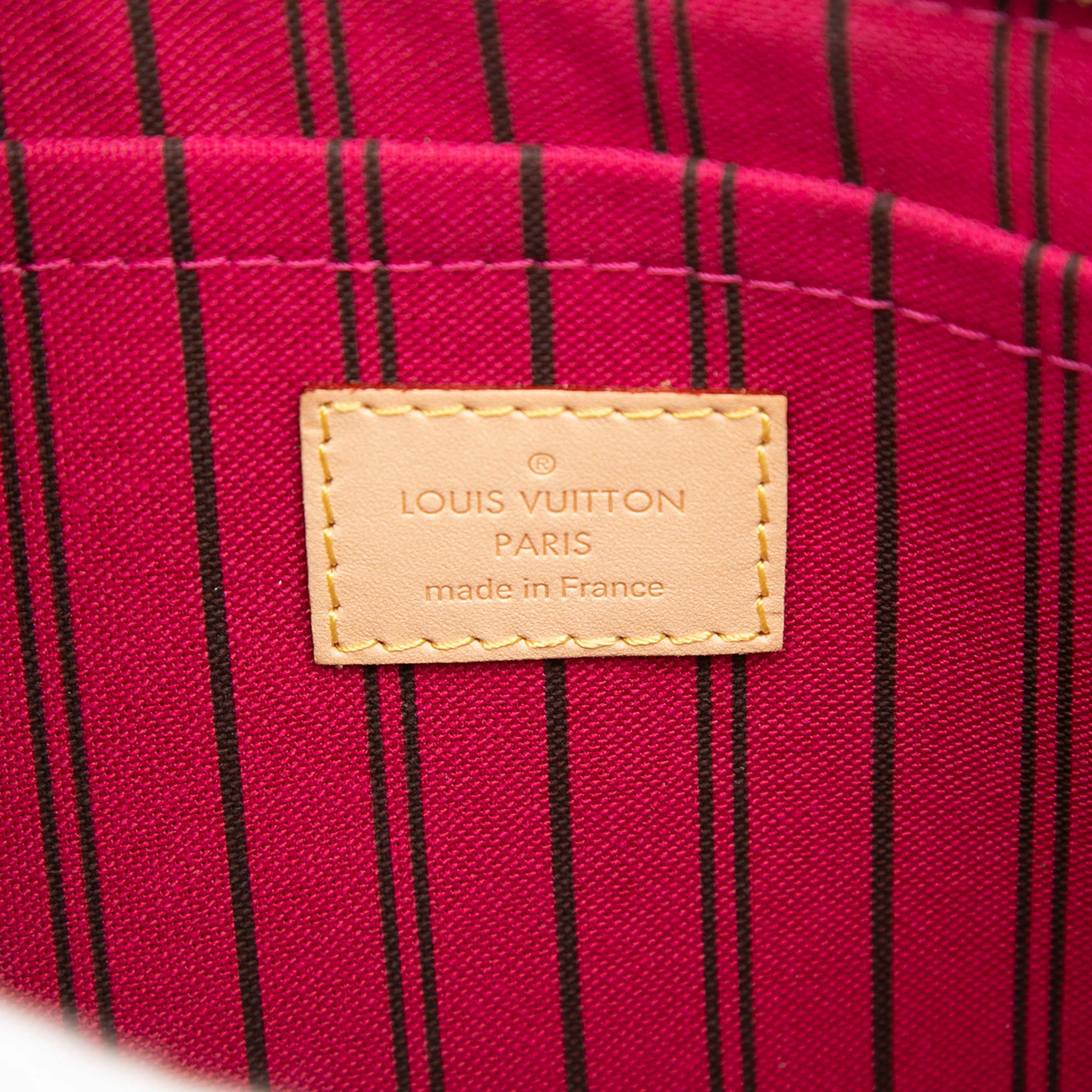 Louis Vuitton Monogram Neverfull Mm Pouch, från Luxclusif, i färgen brown. Klicka för att öppna bilden i stort format