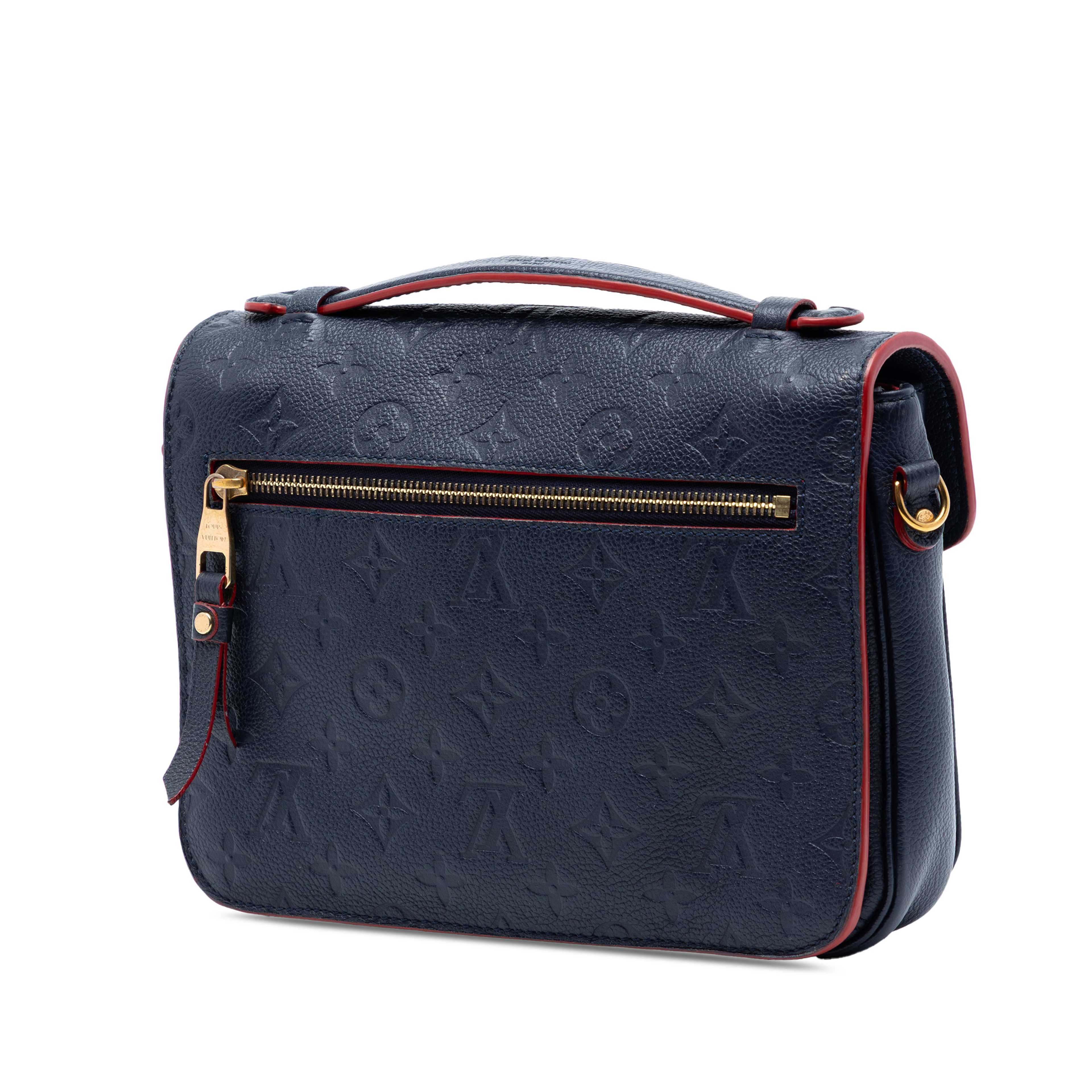 Louis Vuitton Monogram Empreinte Pochette Metis, från Luxclusif, i färgen navy. Klicka för att öppna bilden i stort format
