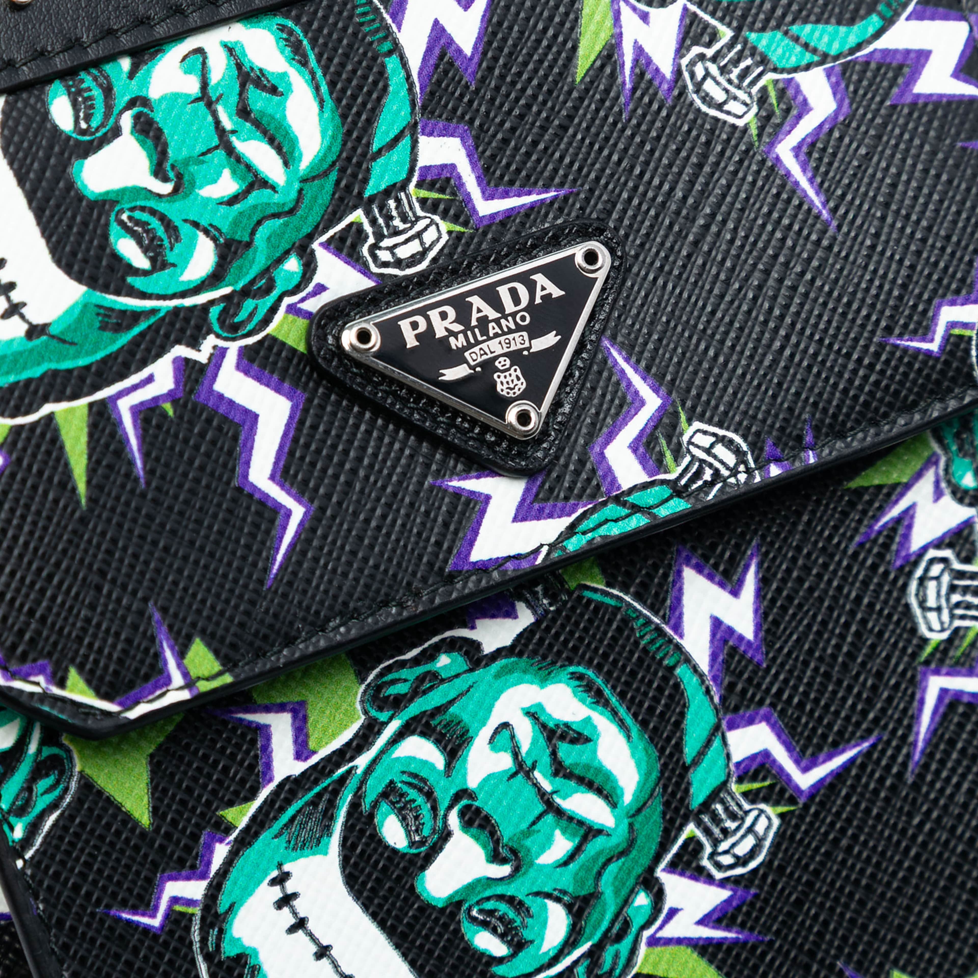 Prada Universal Studios Saffiano Frankenstein Phone Holder, från Luxclusif, i färgen black. Klicka för att öppna bilden i stort format