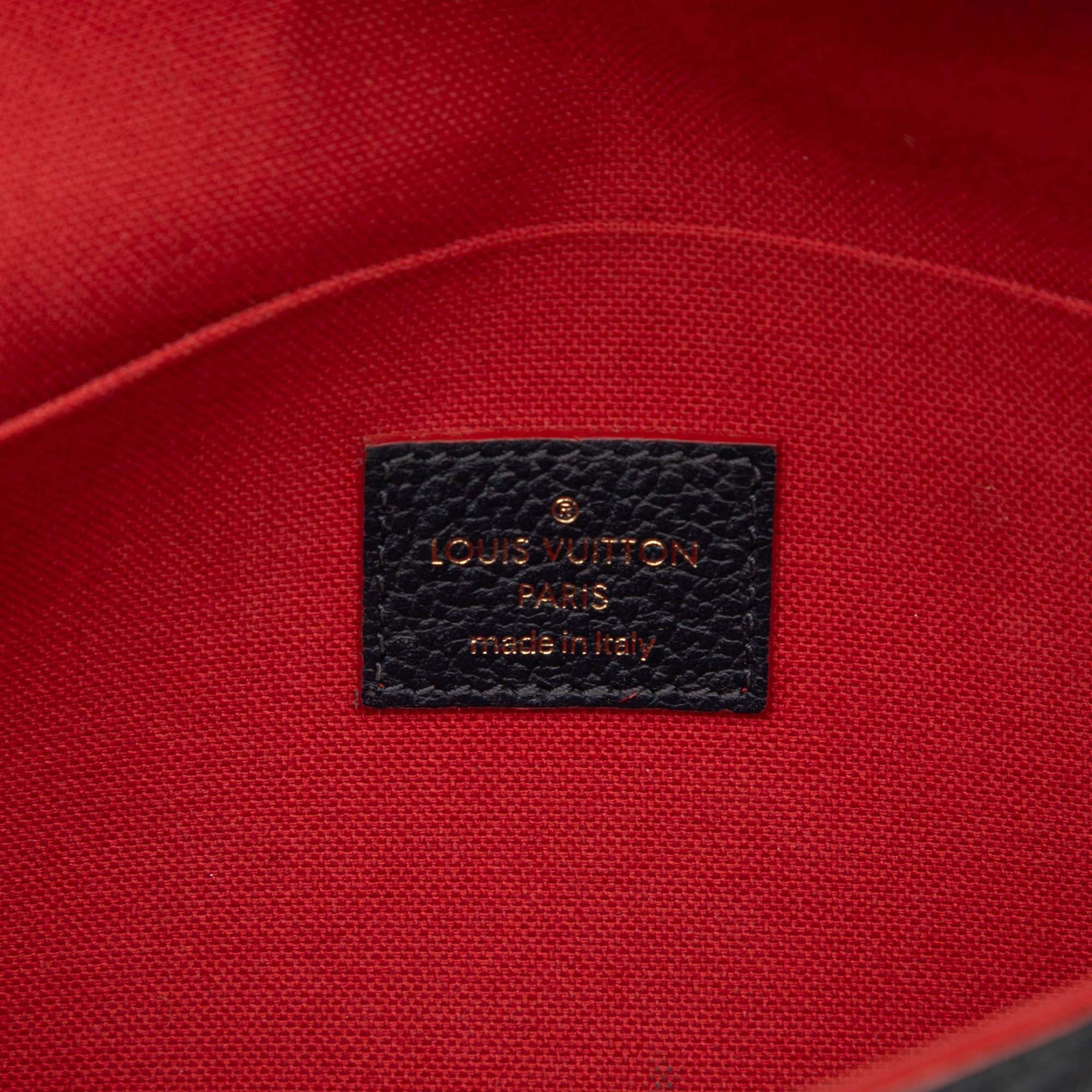 Louis Vuitton Monogram Empreinte Pochette Felicie, från Luxclusif, i färgen navy. Klicka för att öppna bilden i stort format