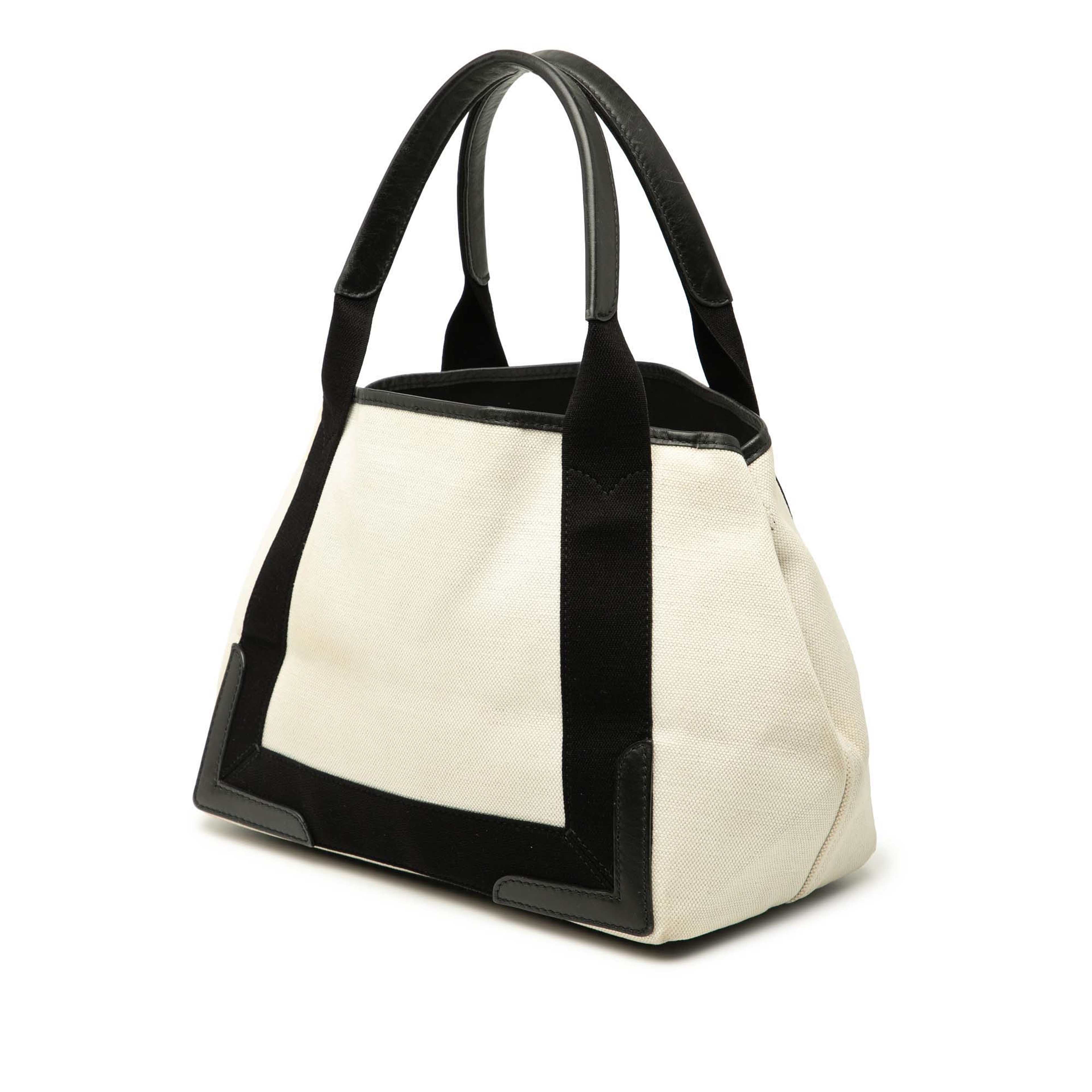 Balenciaga Canvas Navy Cabas Tote S, från Luxclusif, i färgen vit. Klicka för att öppna bilden i stort format