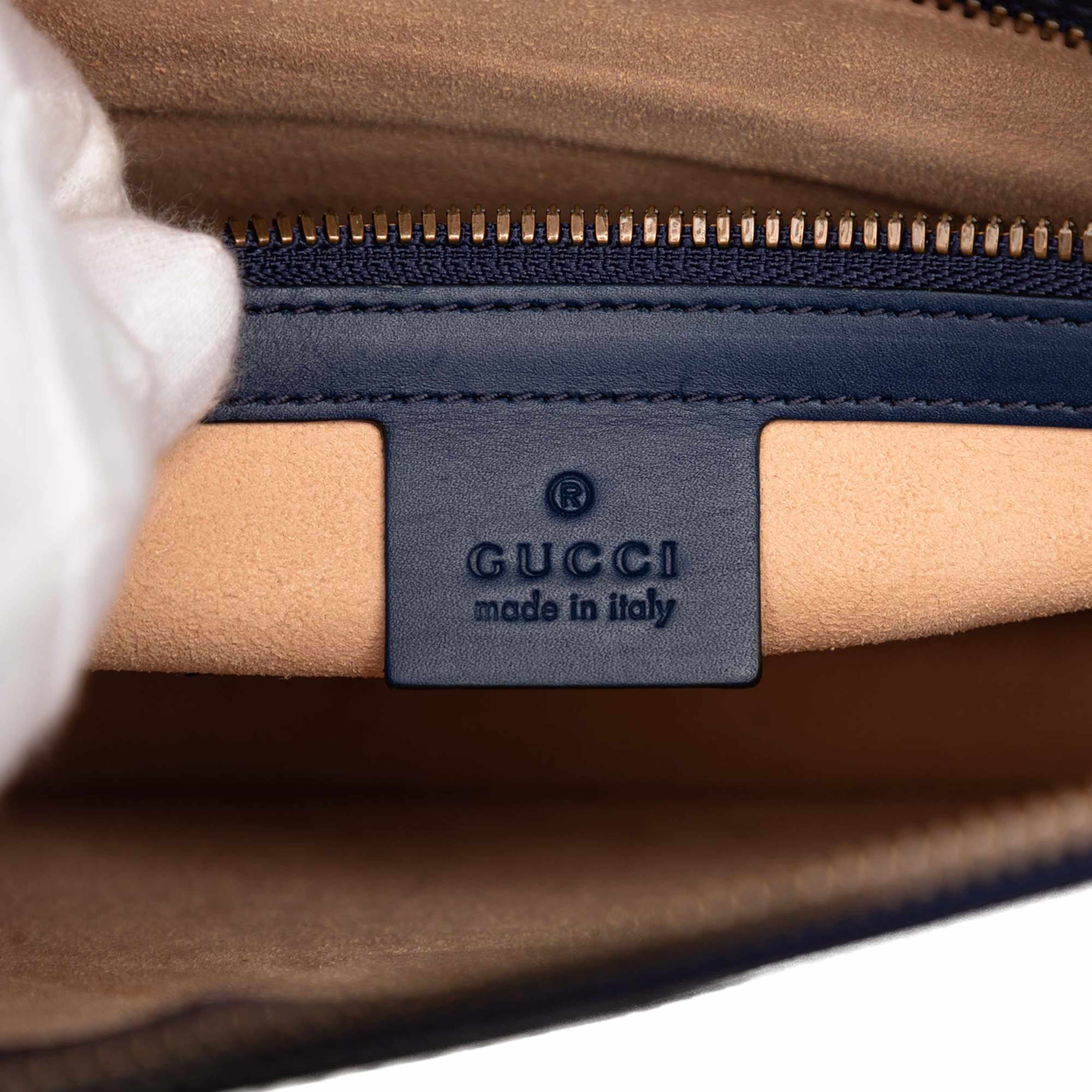Gucci Calfskin Gucci Ghost Clutch, från Luxclusif, i färgen navy. Klicka för att öppna bilden i stort format