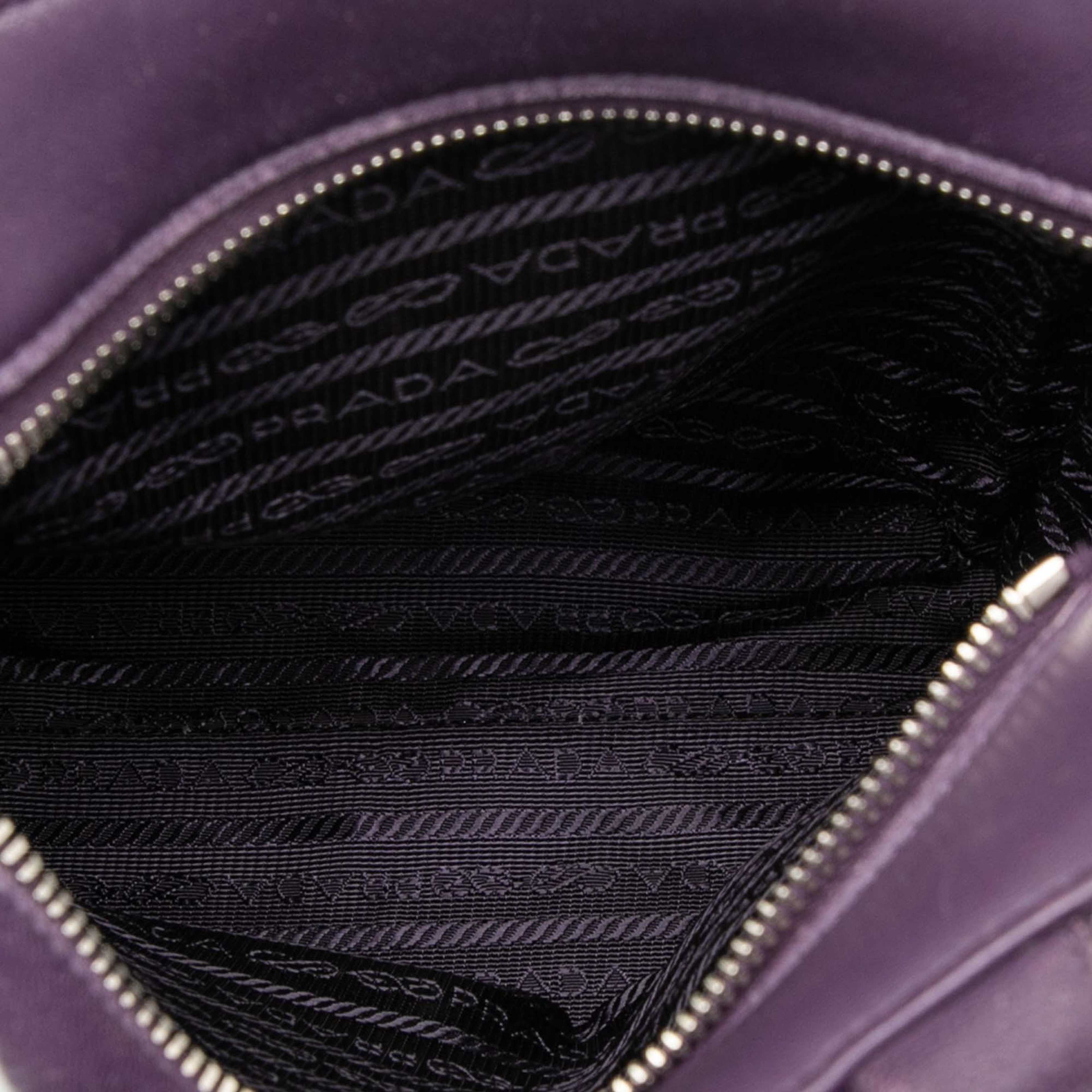 Prada Nappa Front Pocket Satchel, från Luxclusif, i färgen purple. Klicka för att öppna bilden i stort format