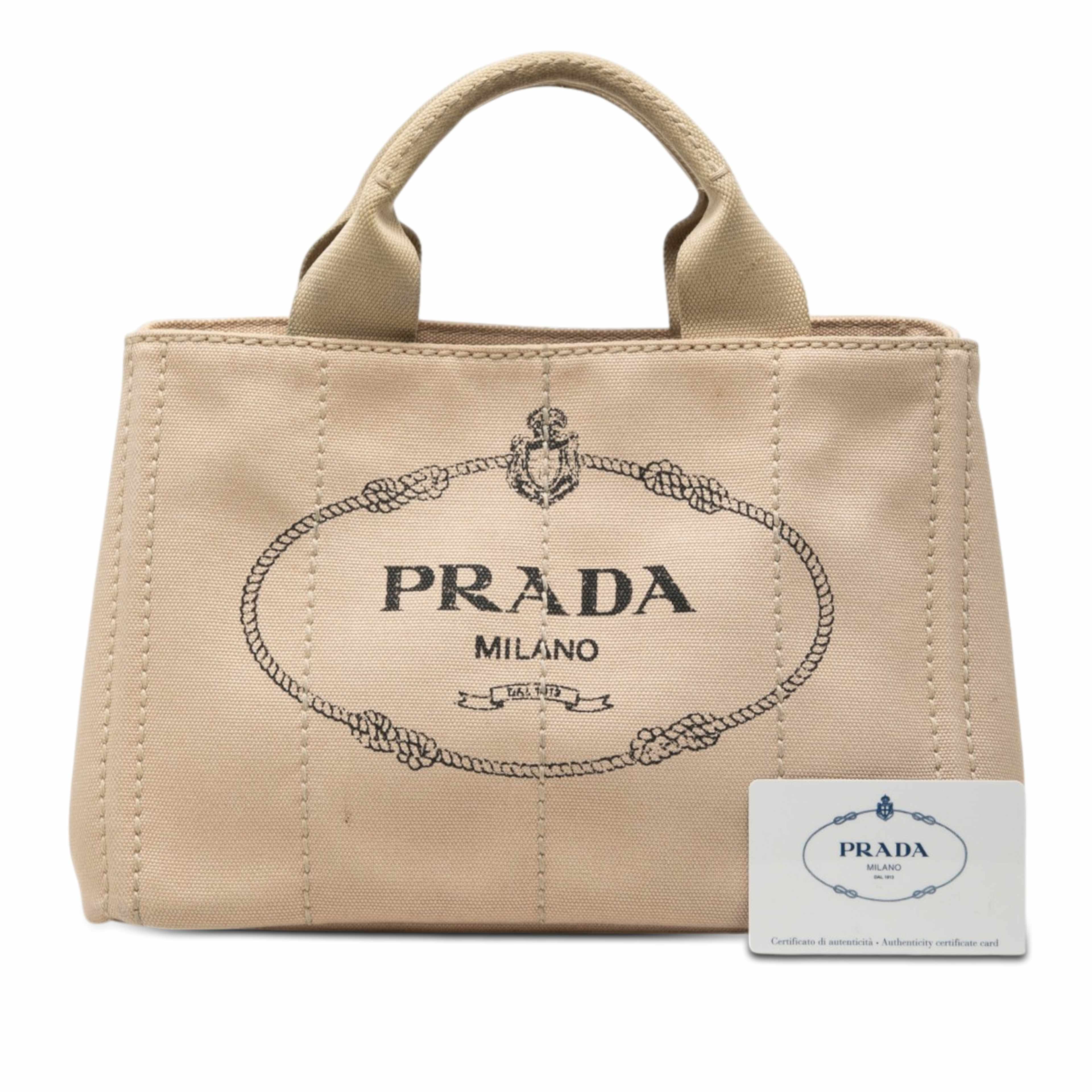 Prada Small Canvas Canapa Logo Tote, från Luxclusif, i färgen beige. Klicka för att öppna bilden i stort format