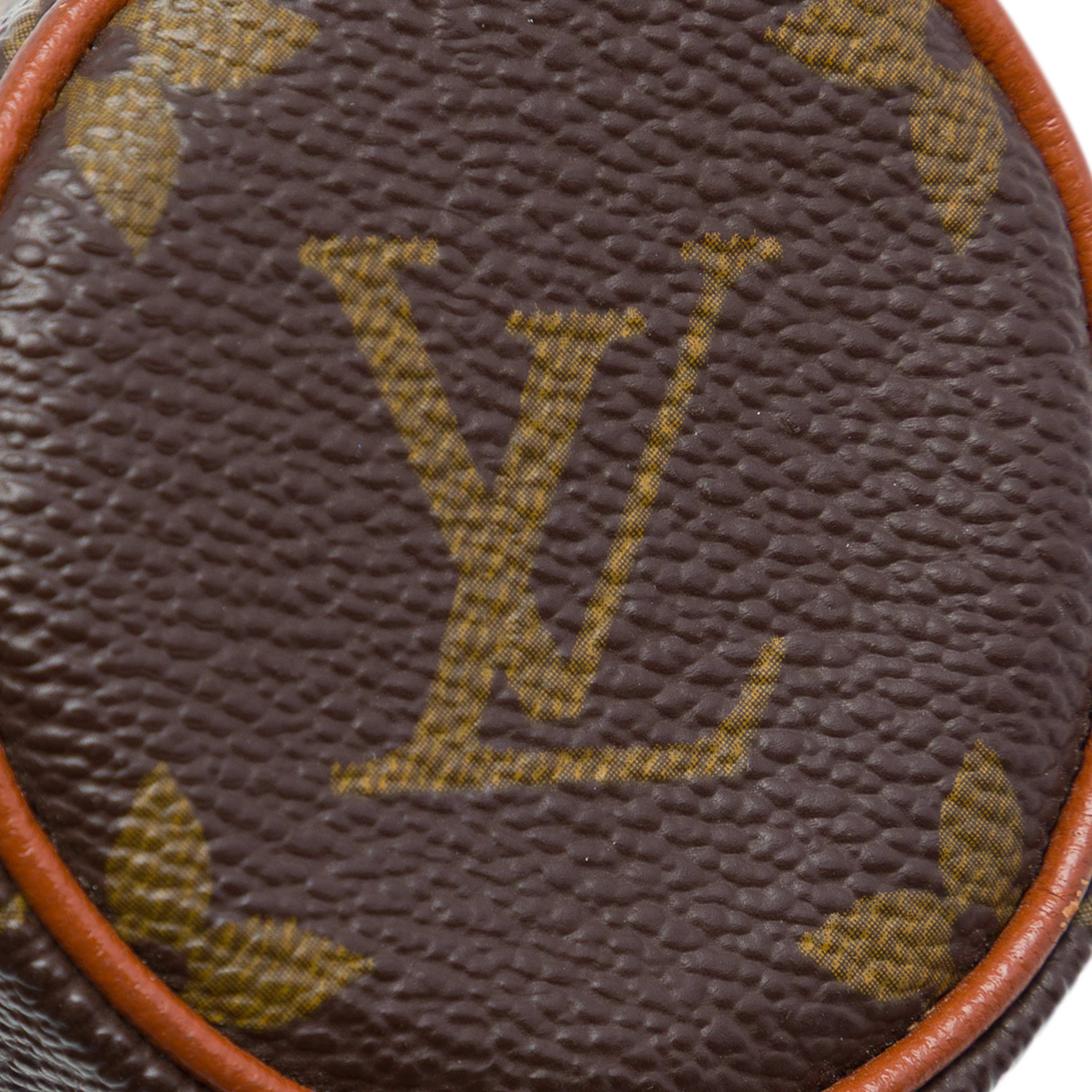 Louis Vuitton Monogram Papillon Pochette, från Luxclusif, i färgen brun. Klicka för att öppna bilden i stort format
