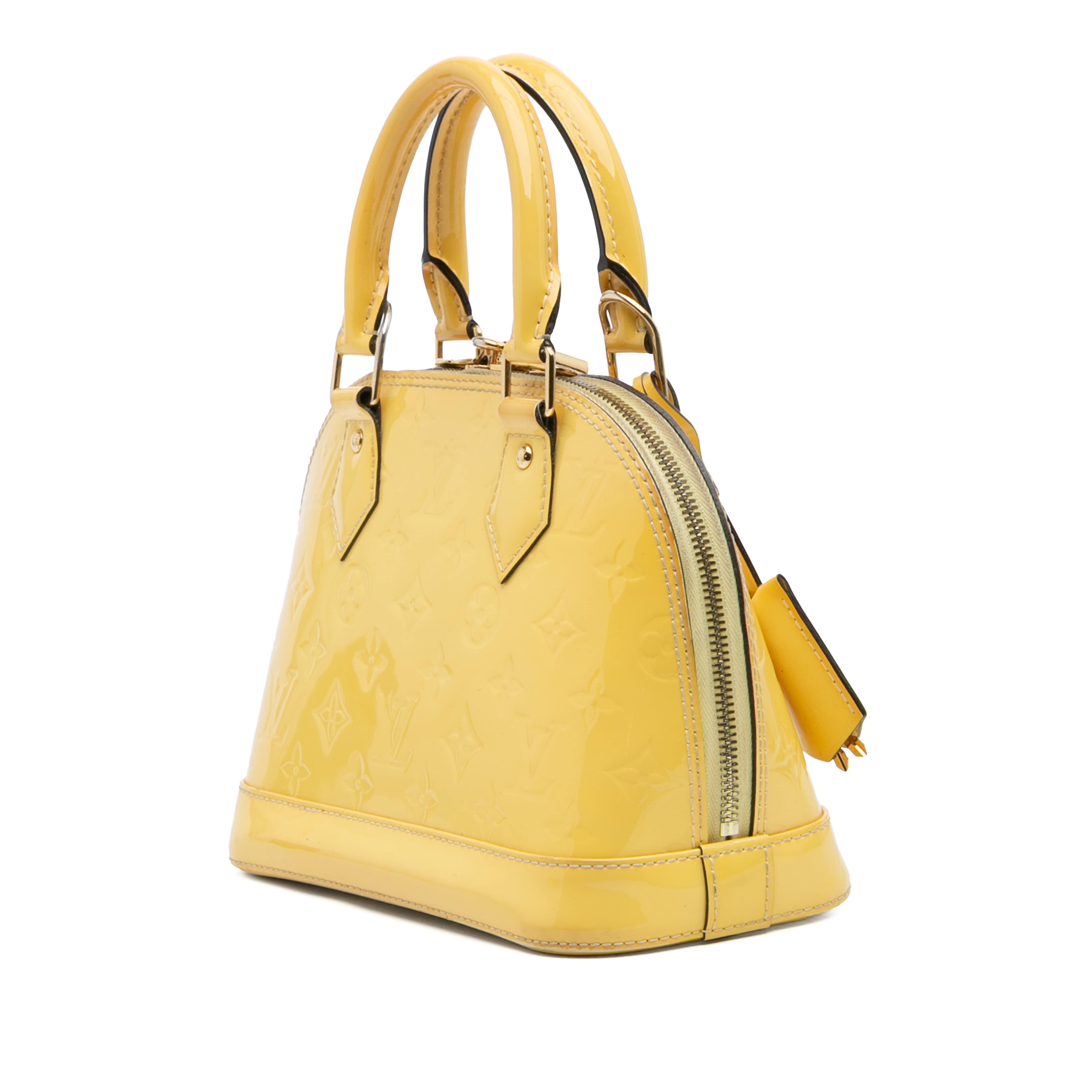 Louis Vuitton Monogram Vernis Alma Bb, från Luxclusif, i färgen yellow. Klicka för att öppna bilden i stort format