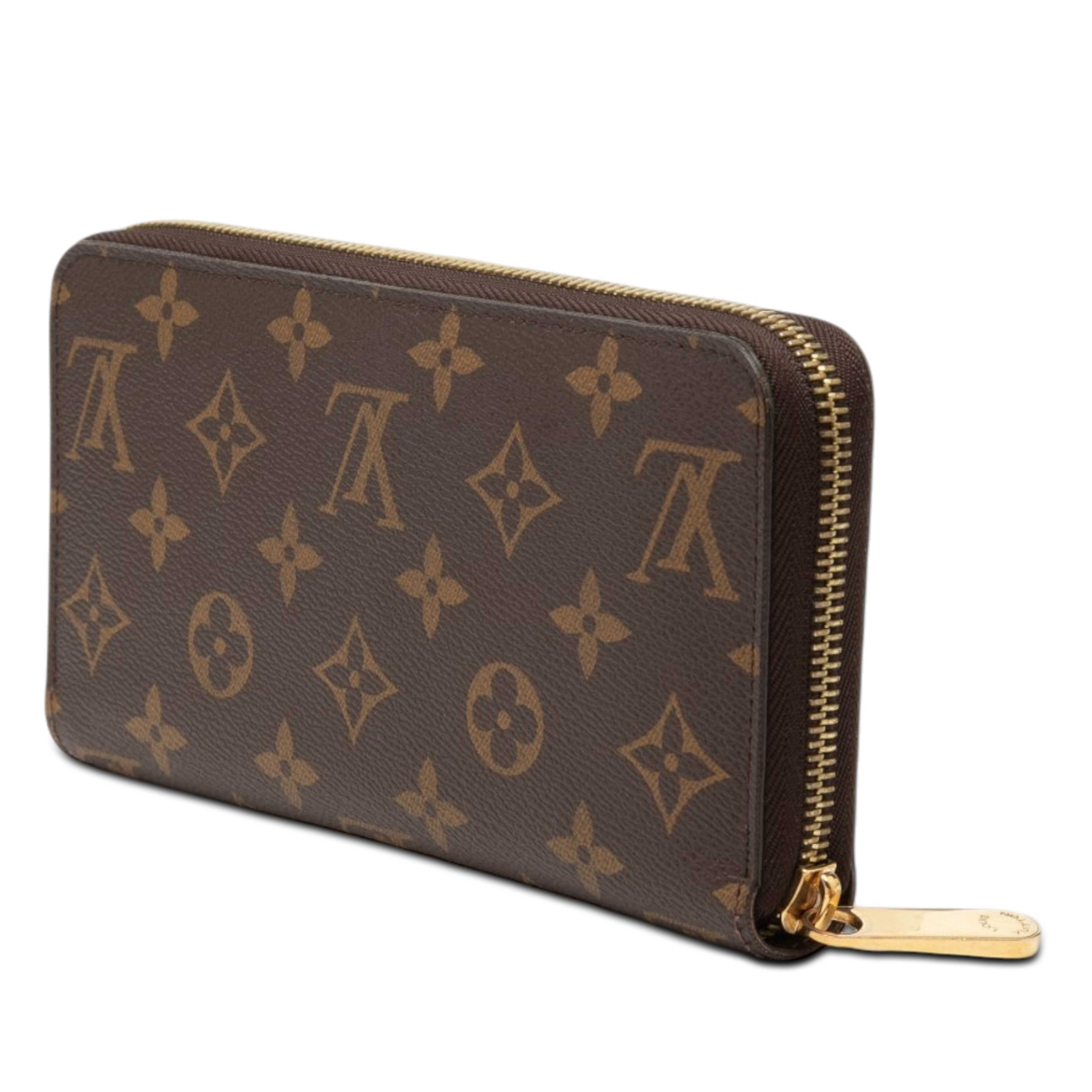 Louis Vuitton Monogram Zippy Wallet, från Luxclusif, i färgen brown. Klicka för att öppna bilden i stort format