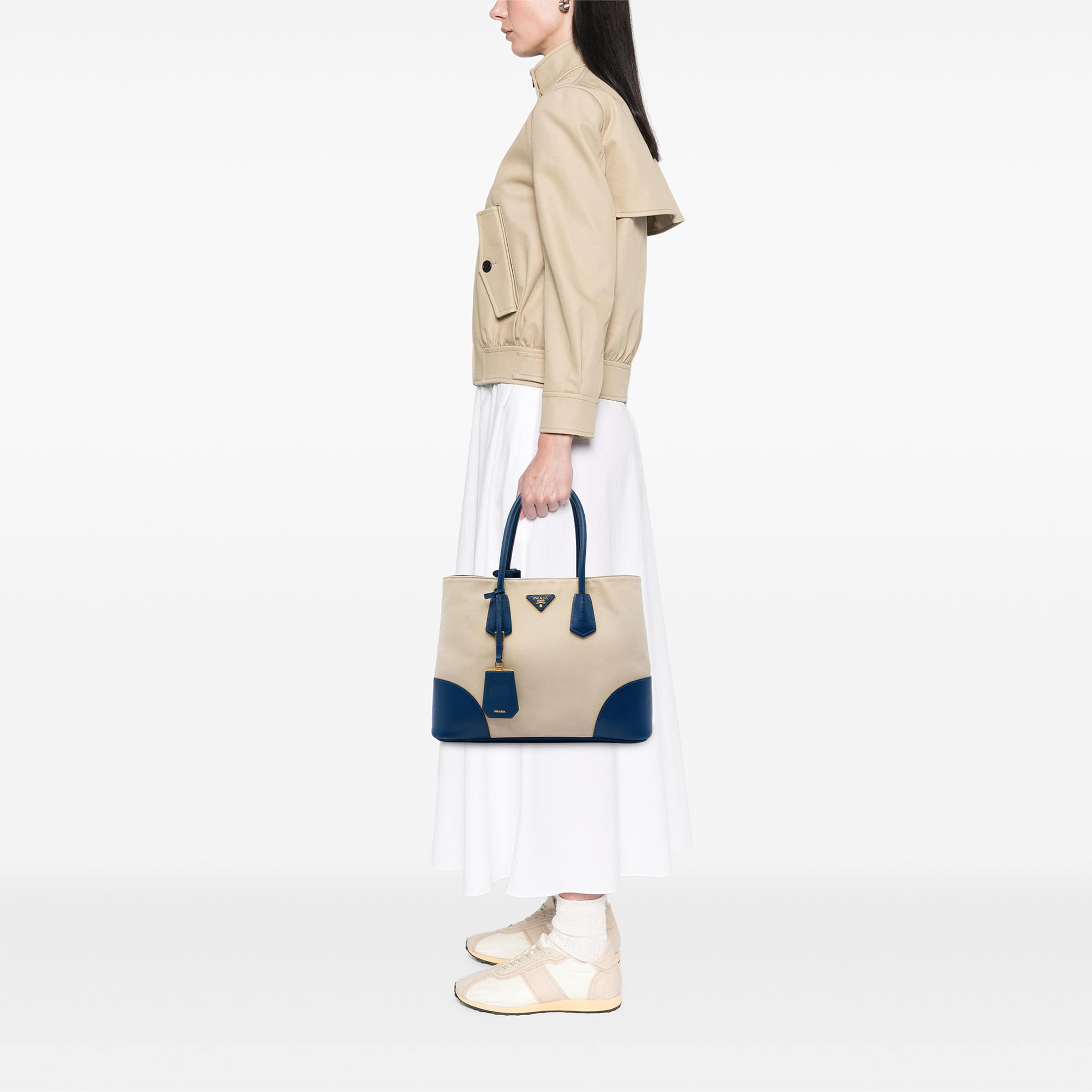 Prada Large Canapa And Saffiano Double Satchel, från Luxclusif, i färgen beige. Klicka för att öppna bilden i stort format