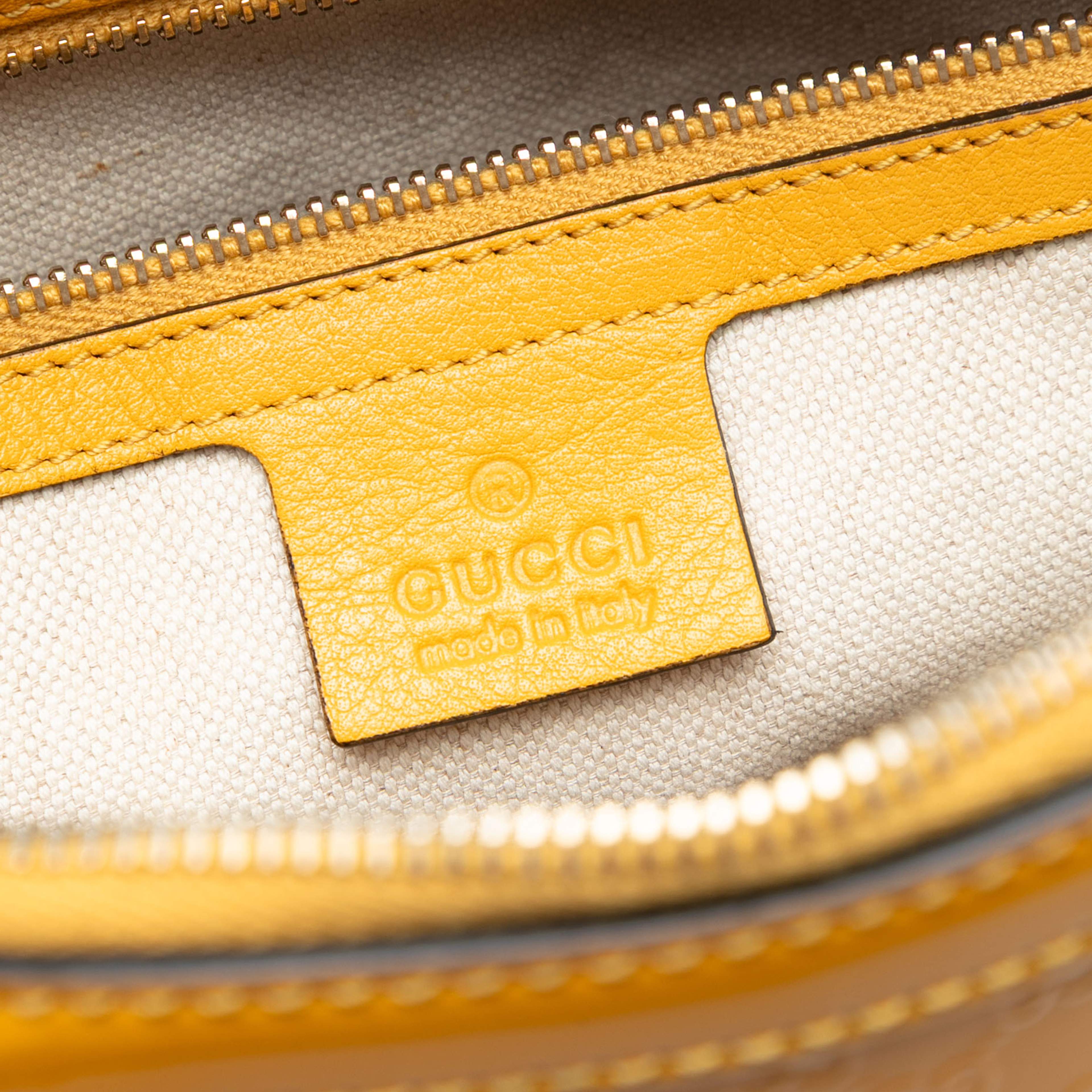 Gucci Medium Microguccissima Patent Nice Dome Satchel, från Luxclusif, i färgen yellow. Klicka för att öppna bilden i stort format