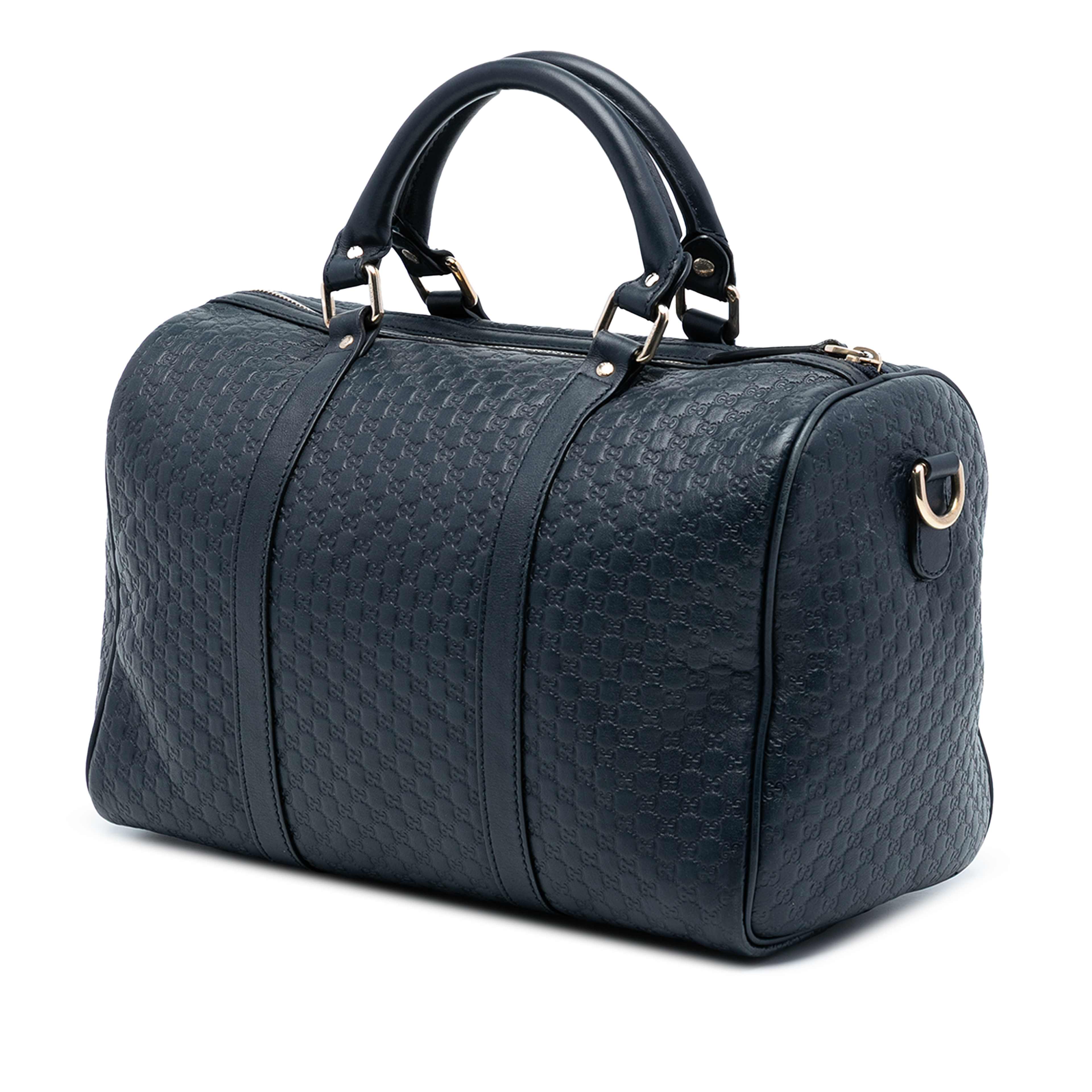 Gucci Medium Microguccissima Boston Bag, från Luxclusif, i färgen navy. Klicka för att öppna bilden i stort format