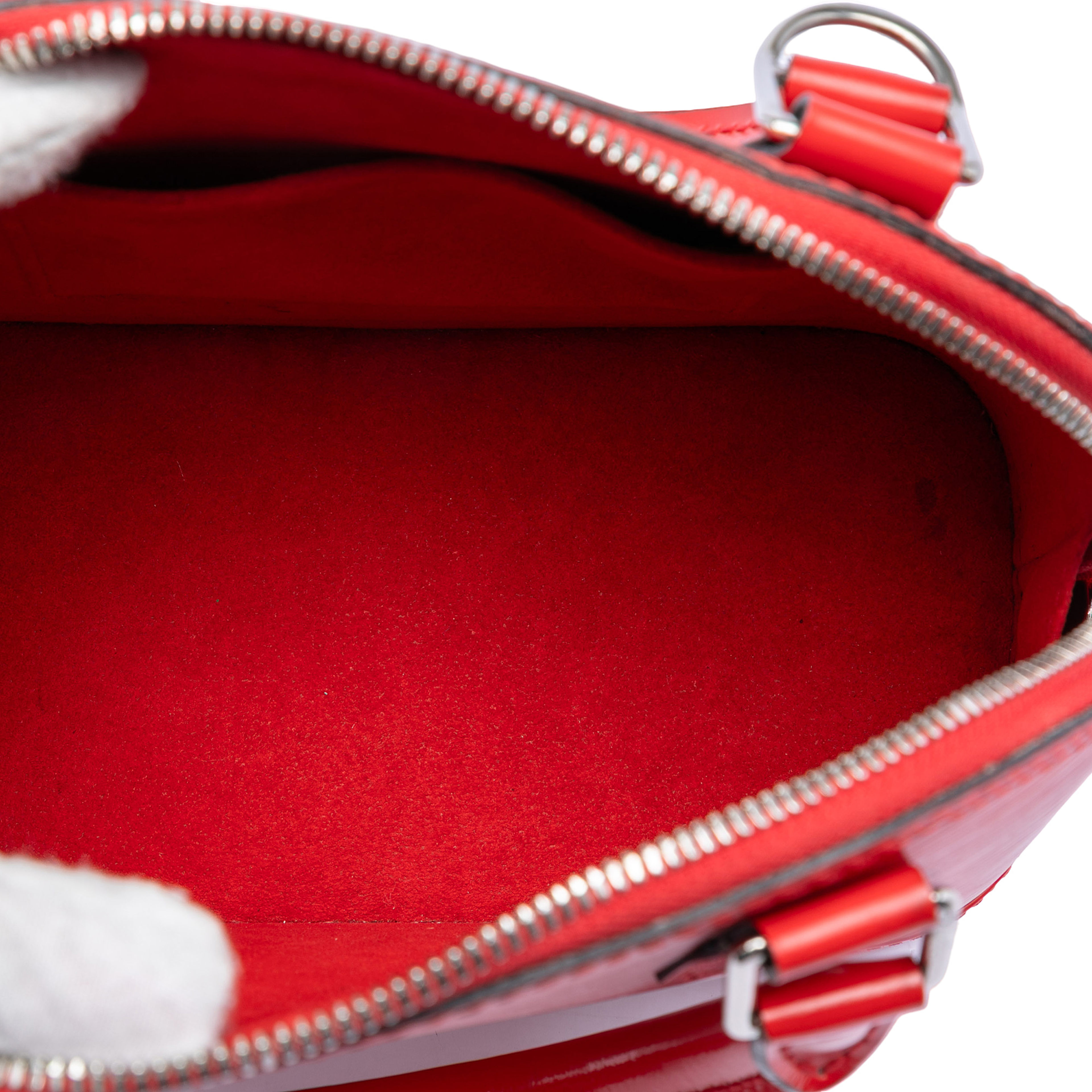 Louis Vuitton Epi Alma Bb, från Luxclusif, i färgen red. Klicka för att öppna bilden i stort format