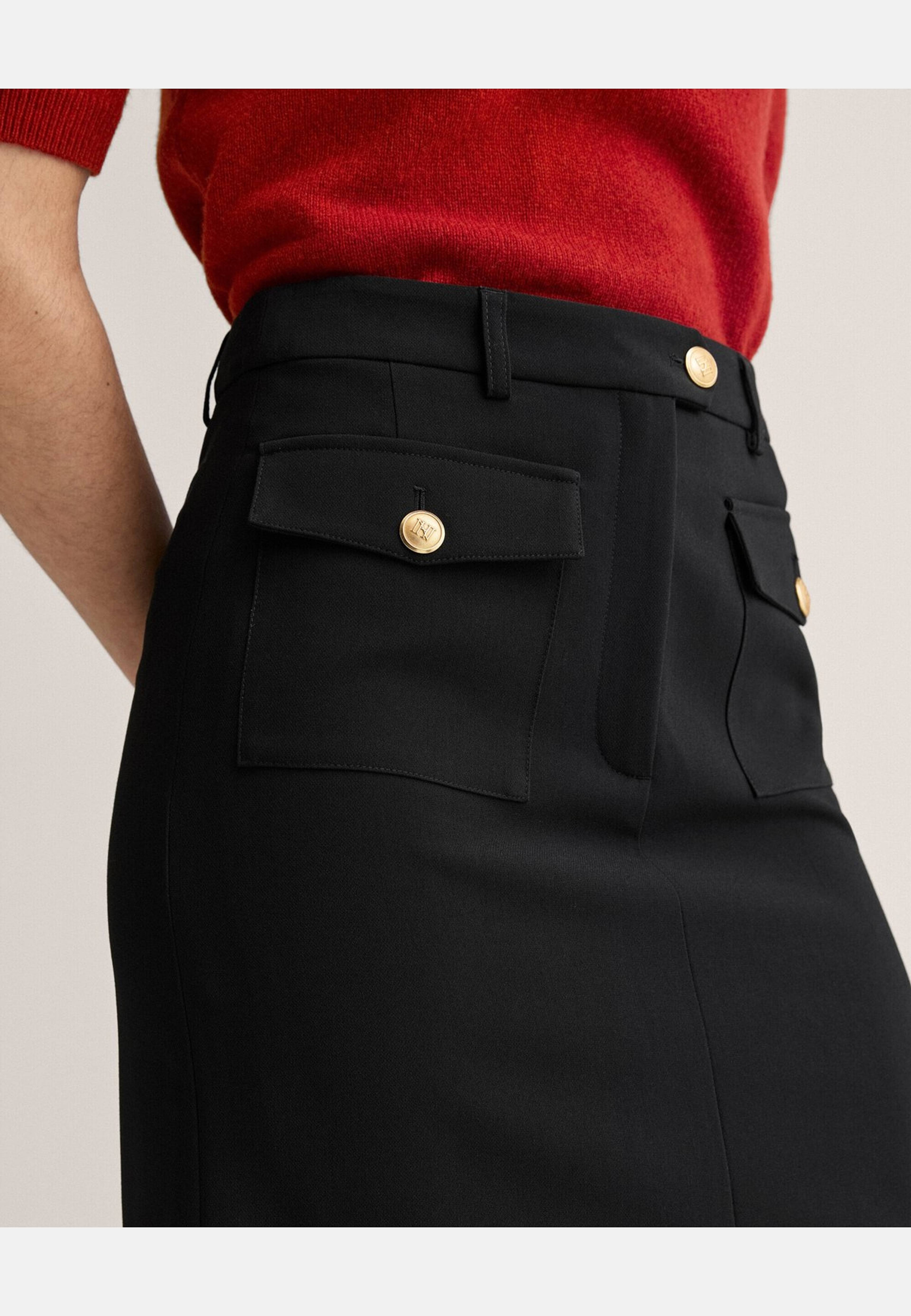 Kjol Milly, från Newhouse, i färgen svart. Klicka för att öppna bilden i stort format