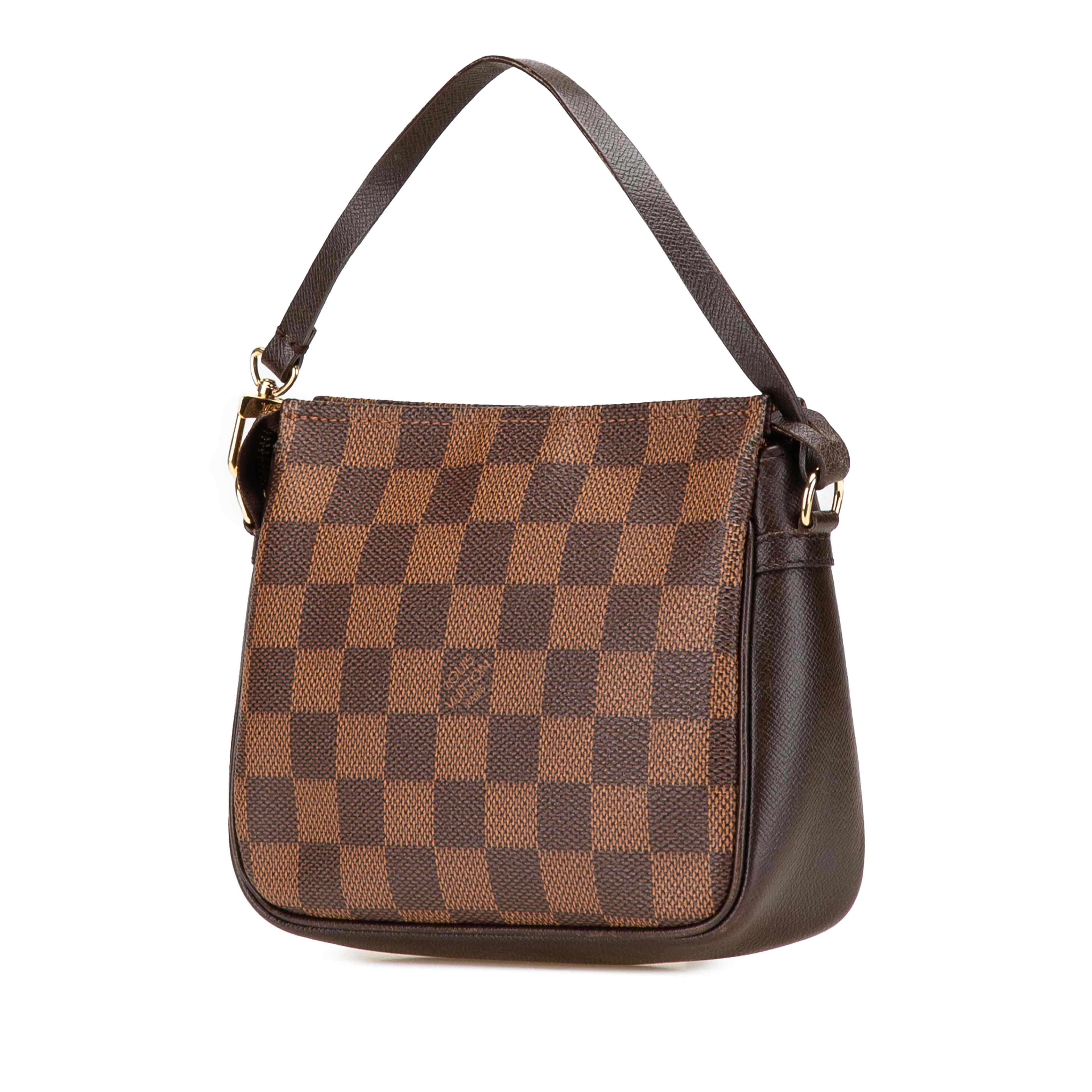 Louis Vuitton Damier Ebene Trousse Pochette, från Luxclusif, i färgen brown. Klicka för att öppna bilden i stort format
