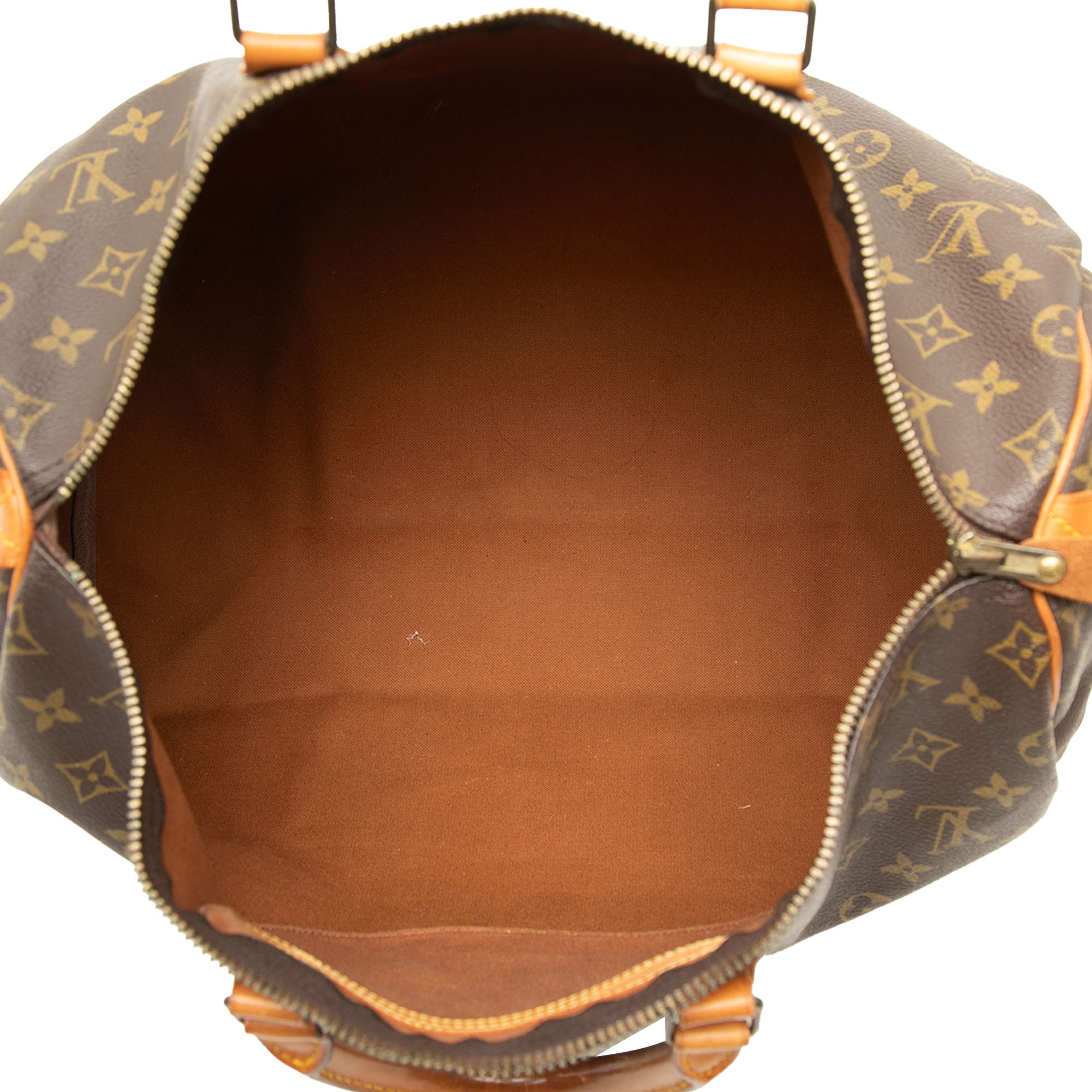 Louis Vuitton Monogram Speedy 40, från Luxclusif, i färgen brun. Klicka för att öppna bilden i stort format