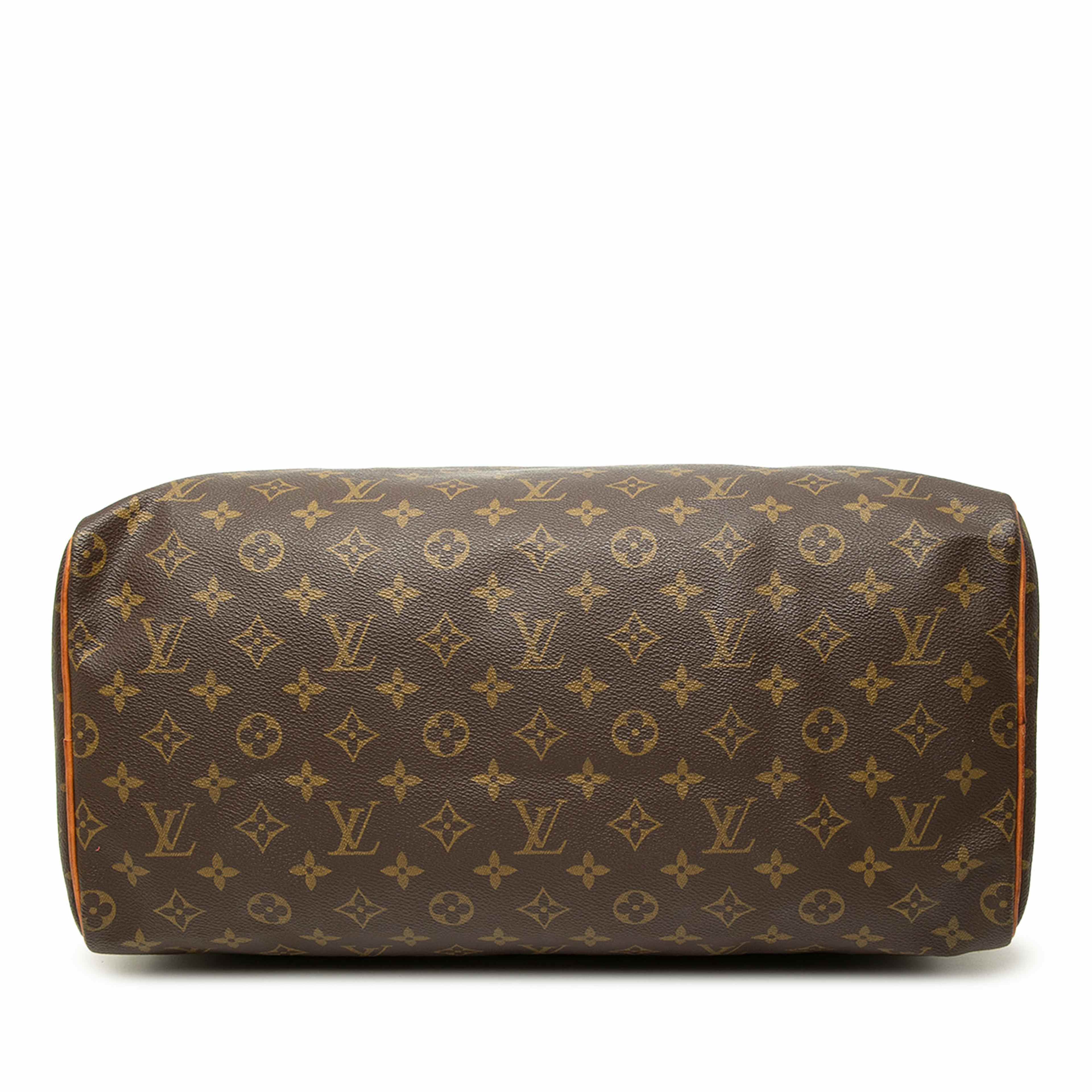 Louis Vuitton Monogram Speedy 40, från Luxclusif, i färgen brun. Klicka för att öppna bilden i stort format
