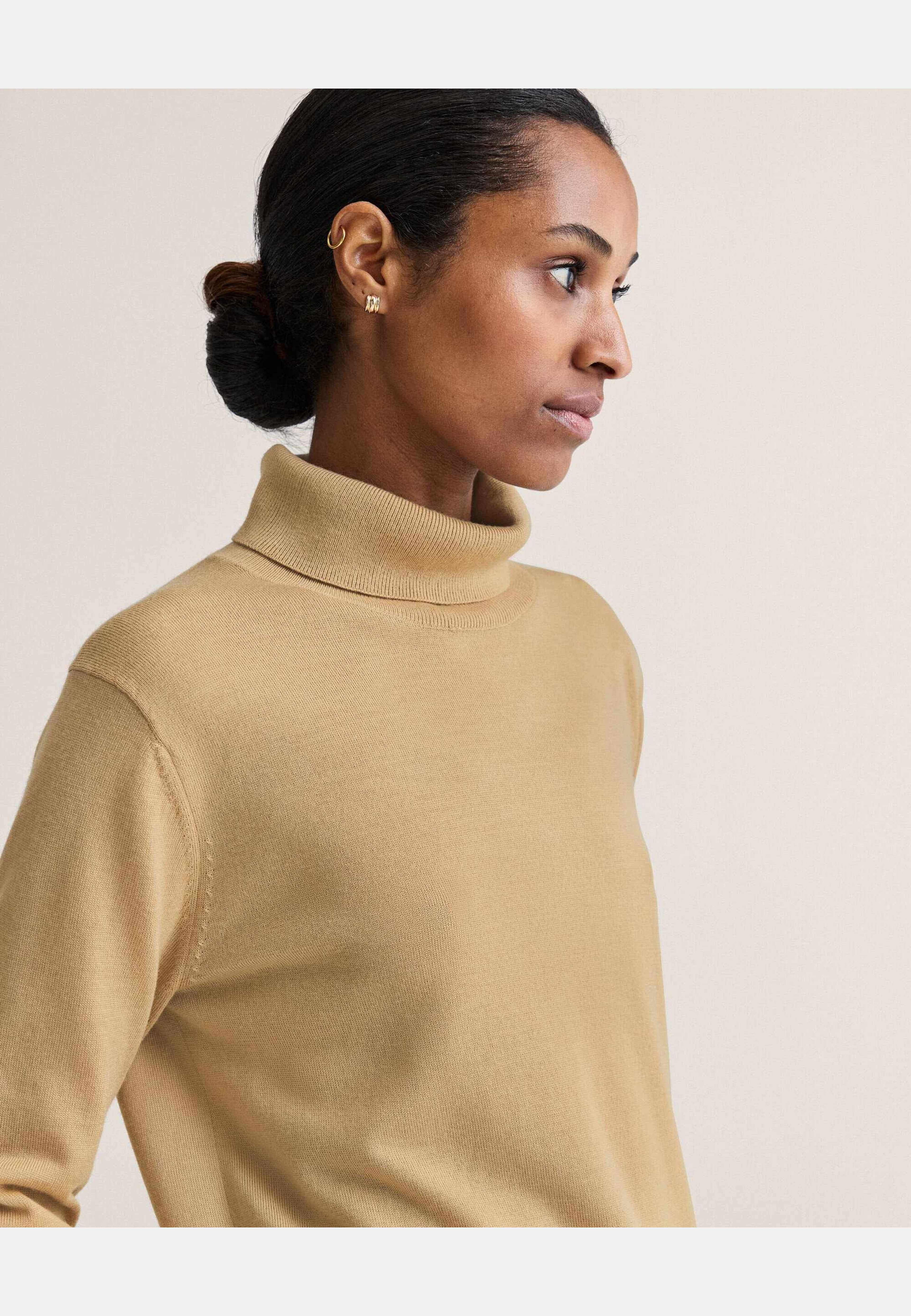 Siri Merino Turtleneck, från Newhouse, i färgen beige. Klicka för att öppna bilden i stort format