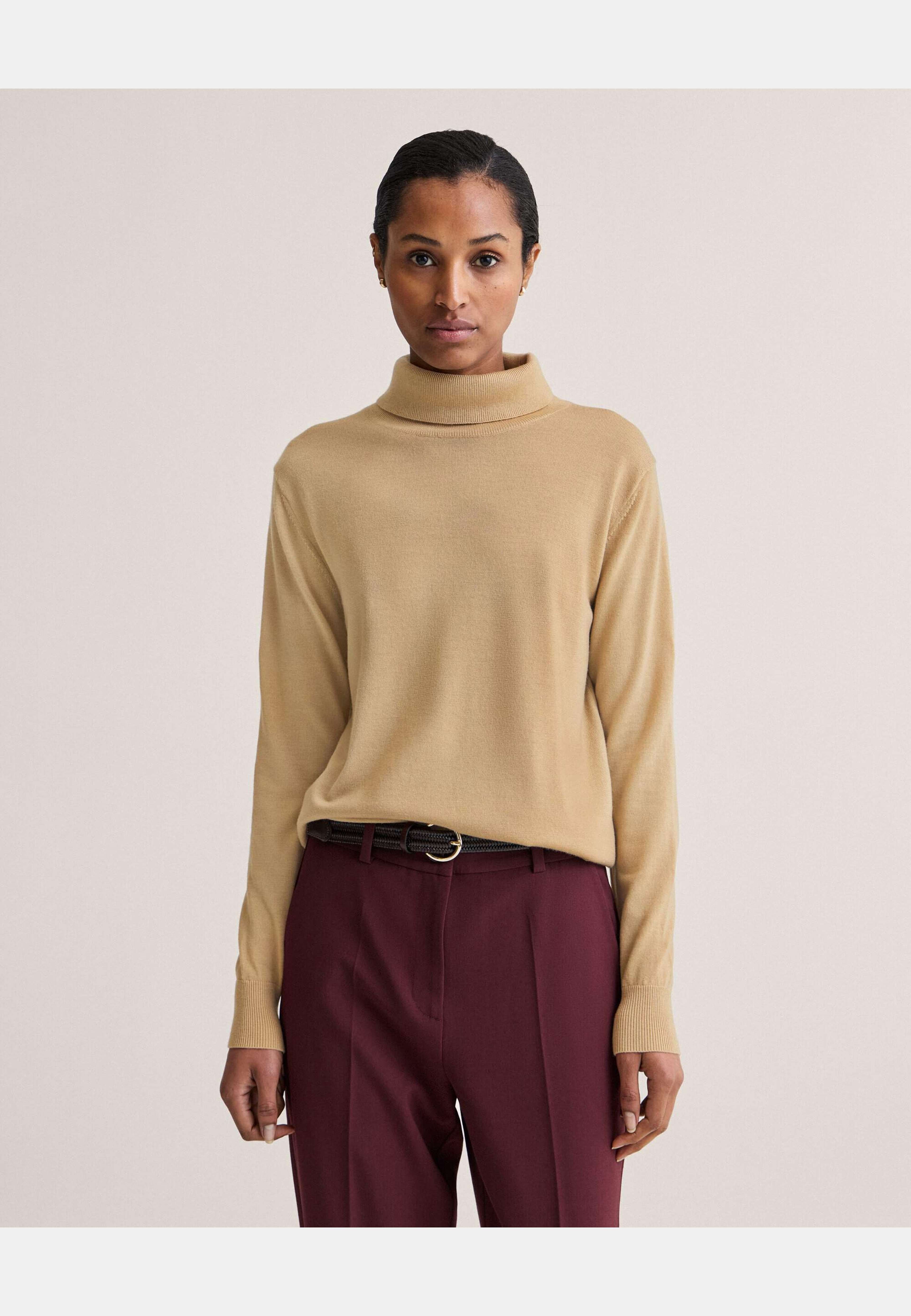 Siri Merino Turtleneck, från Newhouse, i färgen beige. Klicka för att öppna bilden i stort format