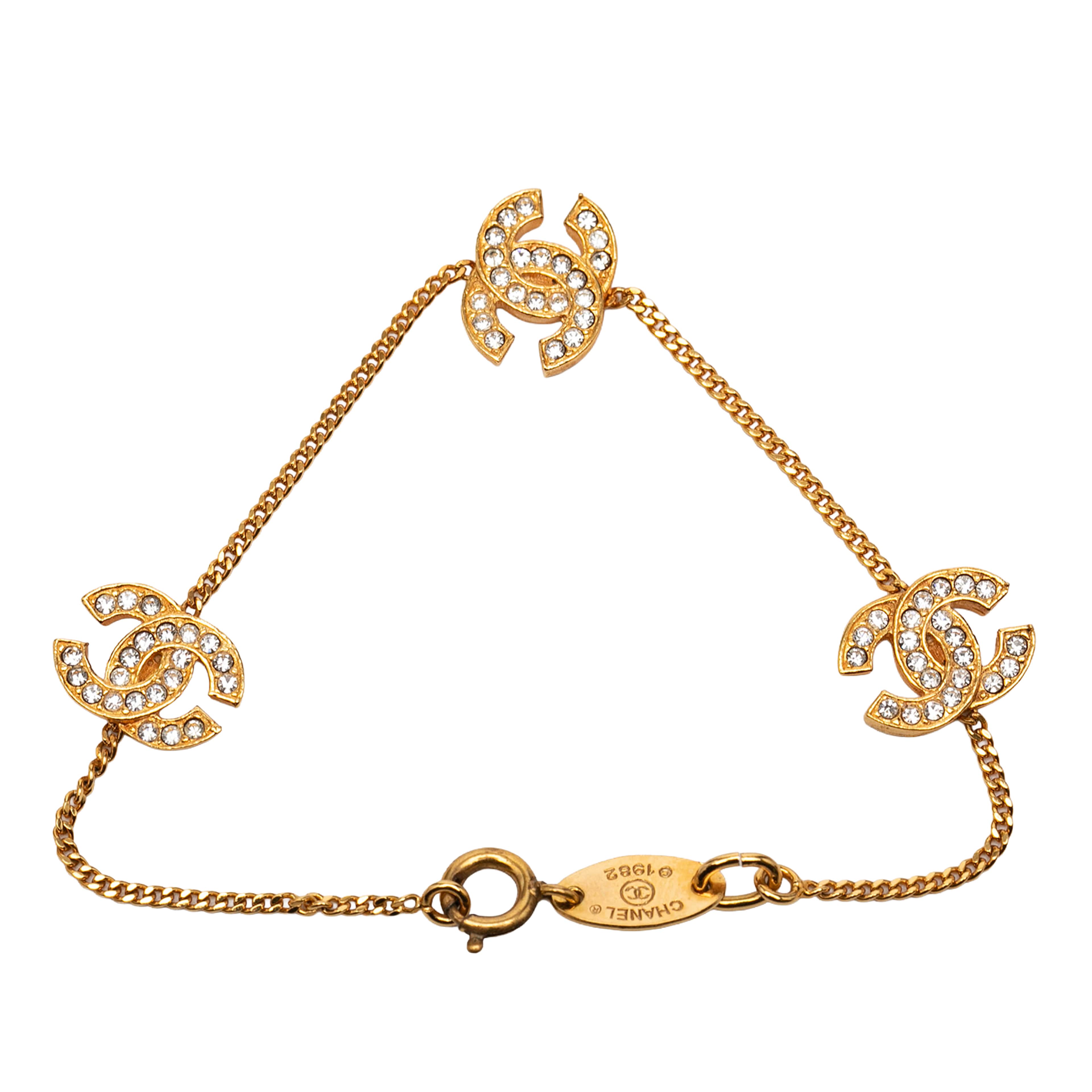 Chanel Triple Cc Gold Plated Strass Bracelet, från Luxclusif, i färgen guld. Klicka för att öppna bilden i stort format