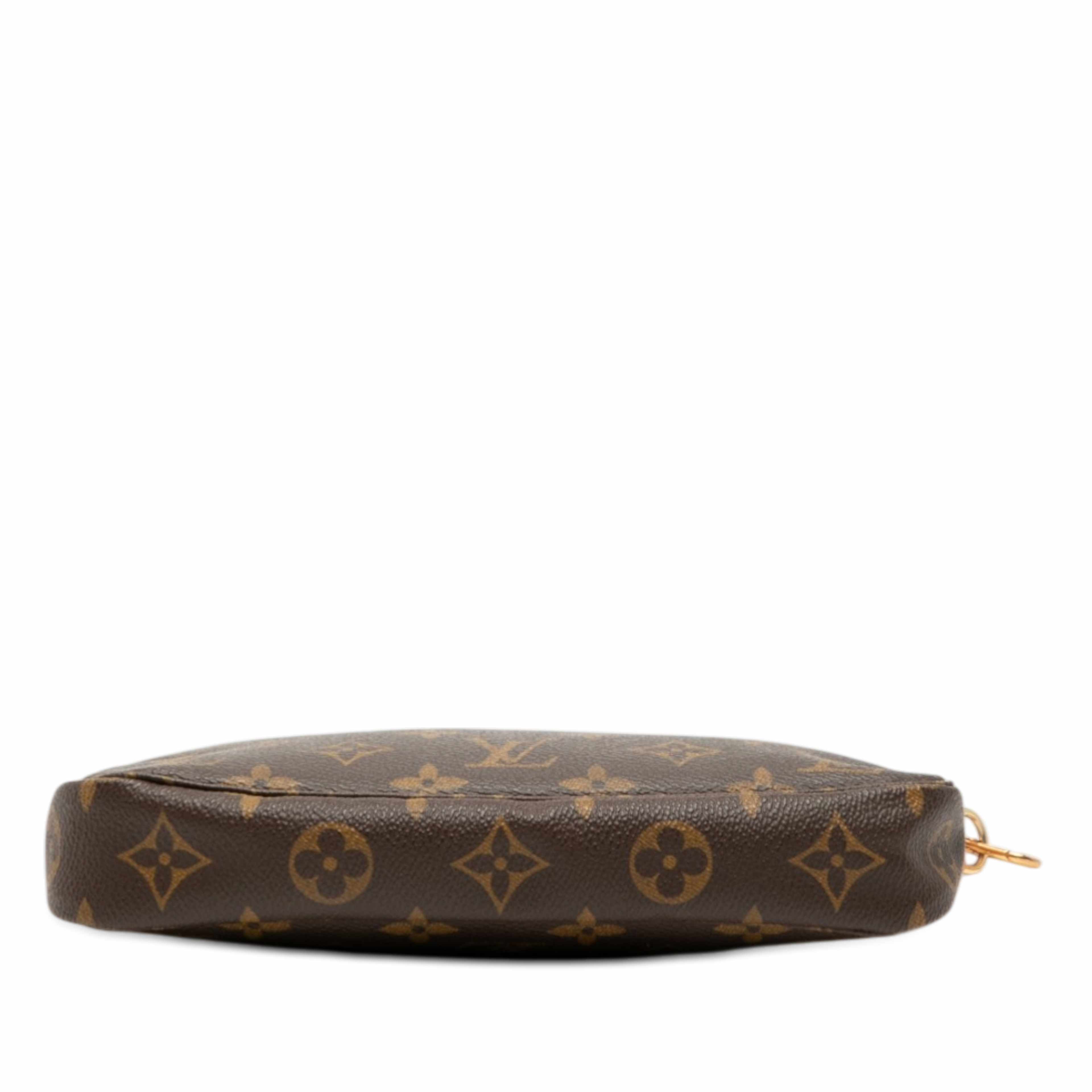 Louis Vuitton Monogram Pochette Accessoires, från Luxclusif, i färgen brown. Klicka för att öppna bilden i stort format