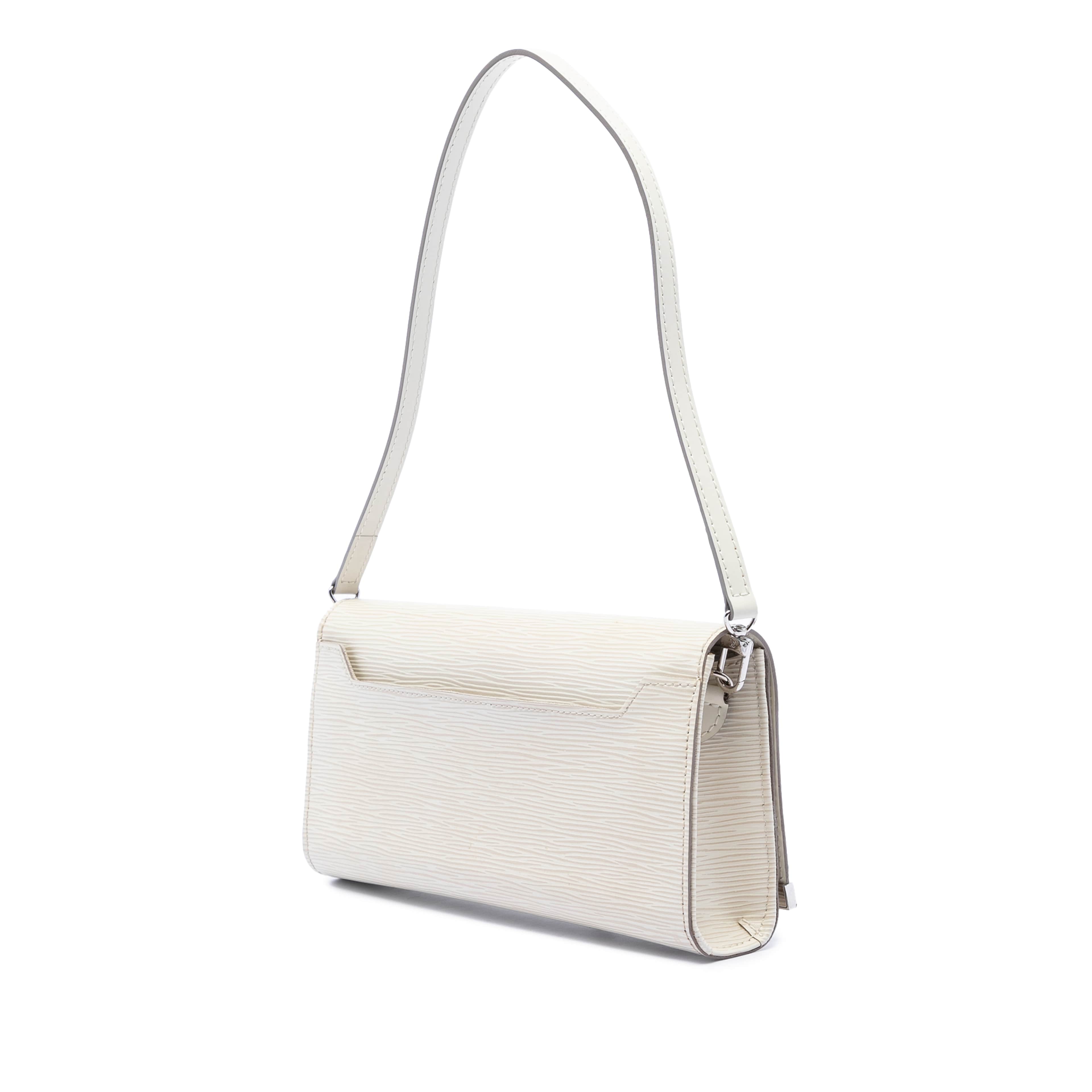 Louis Vuitton Epi Sevigne Clutch, från Luxclusif, i färgen light beige. Klicka för att öppna bilden i stort format