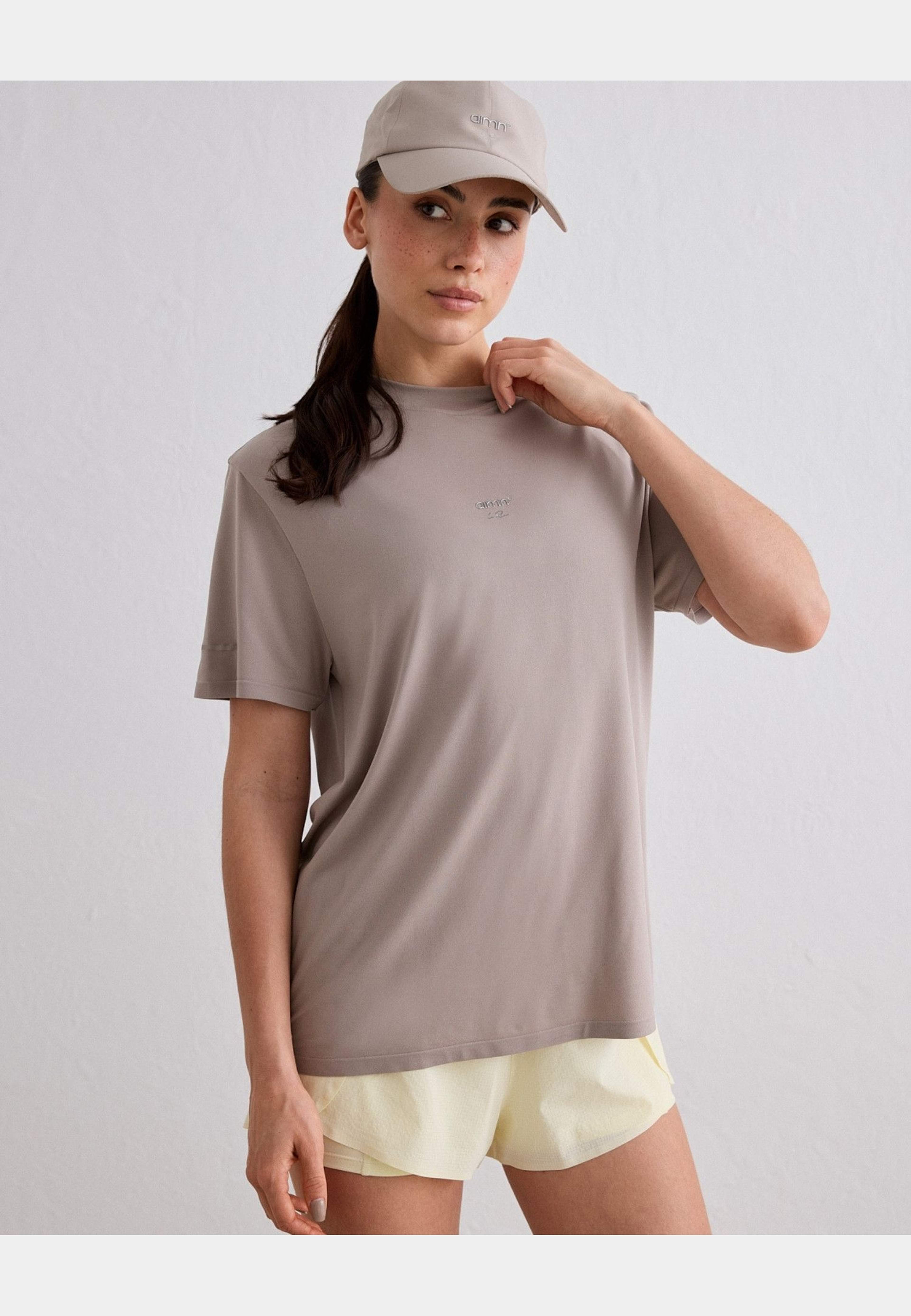Le Run Seamless Running T-shirt, från aim'n, i färgen dark clay. Klicka för att öppna bilden i stort format