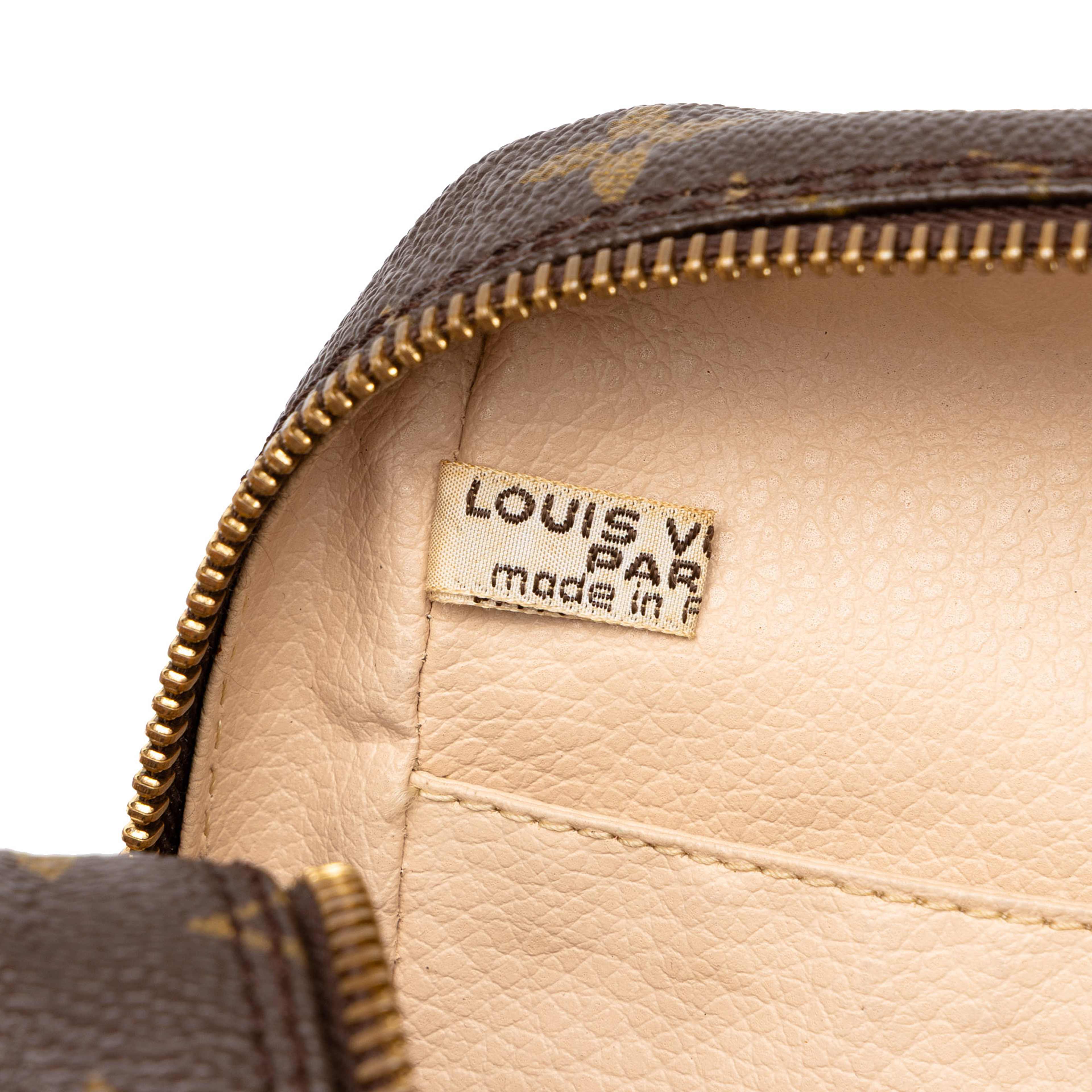 Louis Vuitton Monogram Trousse Toilette 23, från Luxclusif, i färgen brun. Klicka för att öppna bilden i stort format