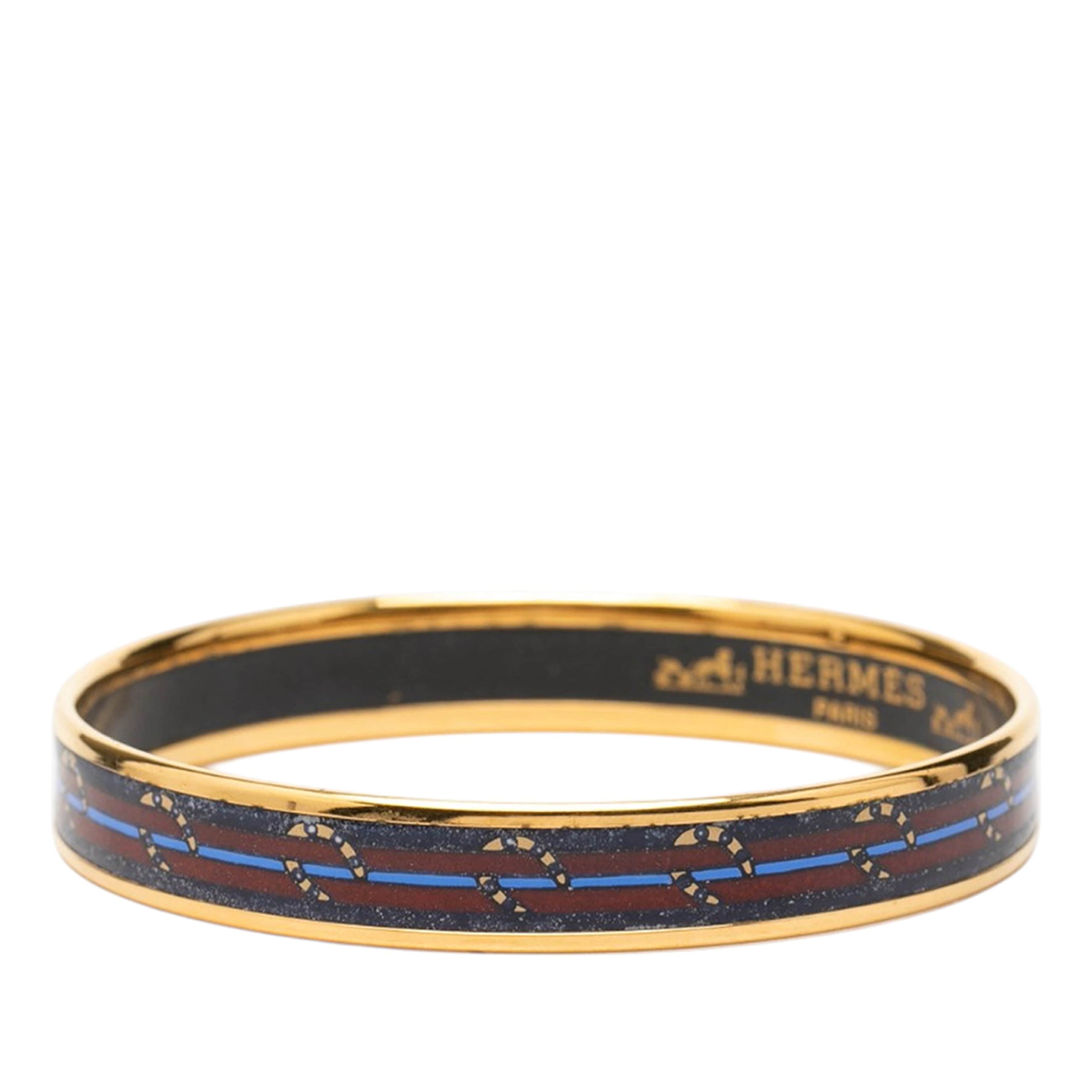 Hermès Narrow Horse Horseshoe Cloisonne Enamel Bangle 62, från Luxclusif, i färgen purpur. Klicka för att öppna bilden i stort format