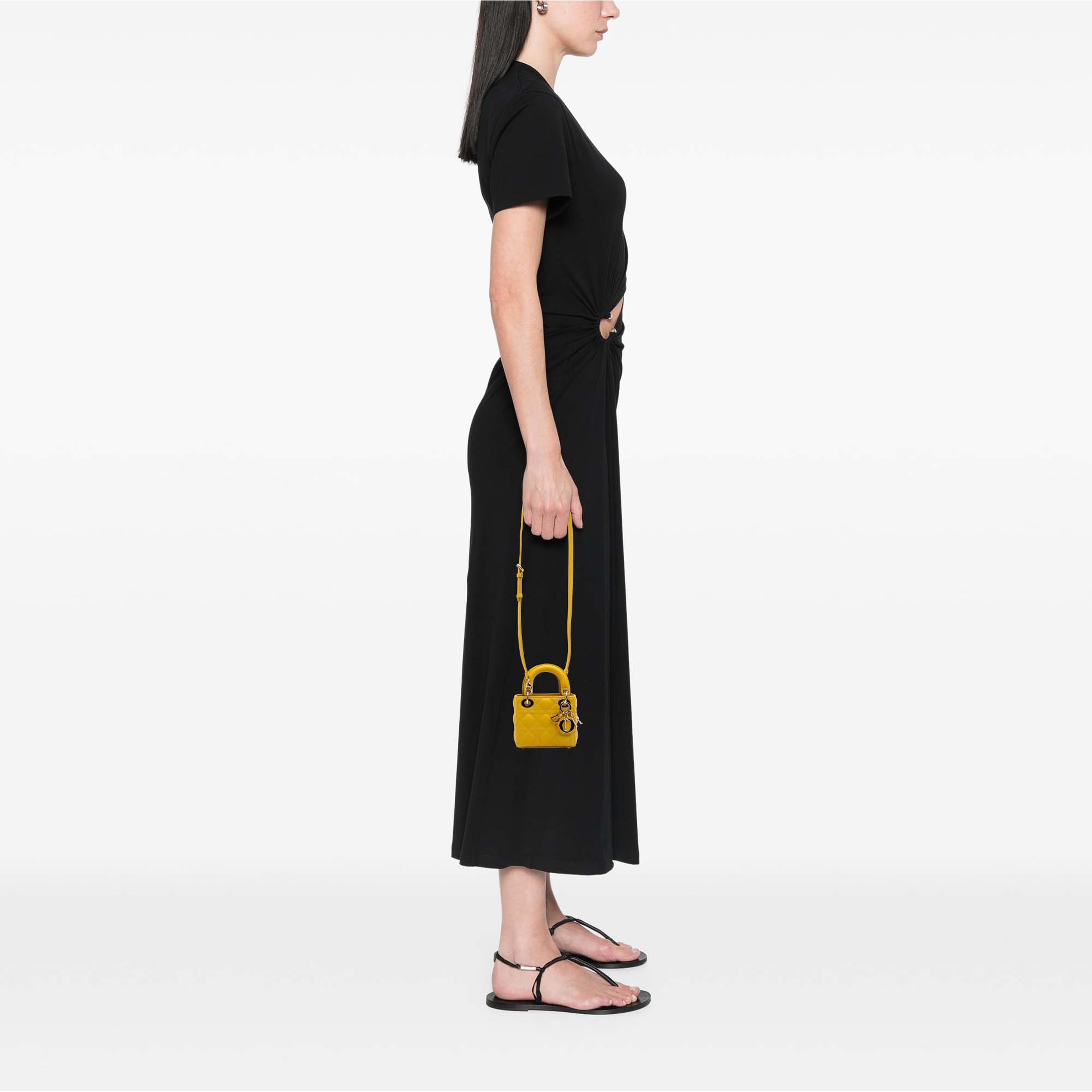 Dior Micro Lambskin Cannage Lady Dior, från Luxclusif, i färgen gul. Klicka för att öppna bilden i stort format