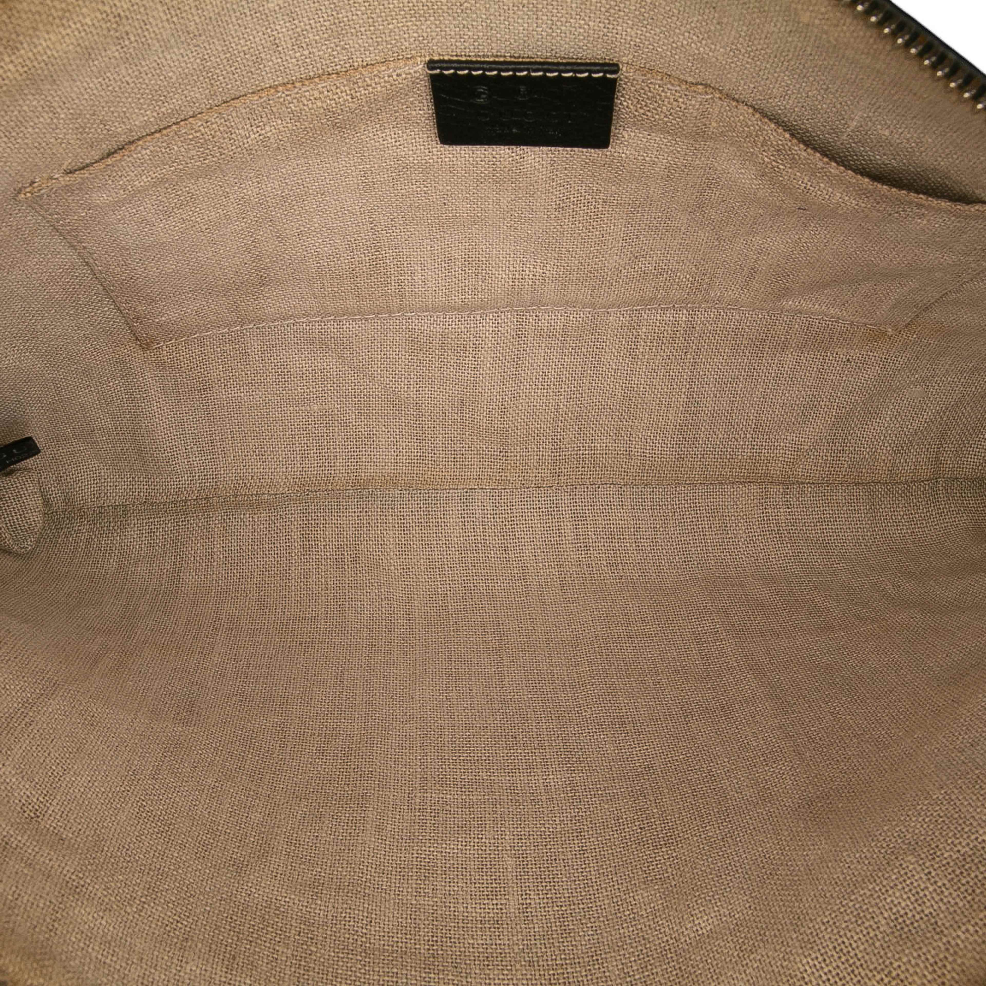 Gucci Calfskin Bamboo Tassel Clutch, från Luxclusif, i färgen black.