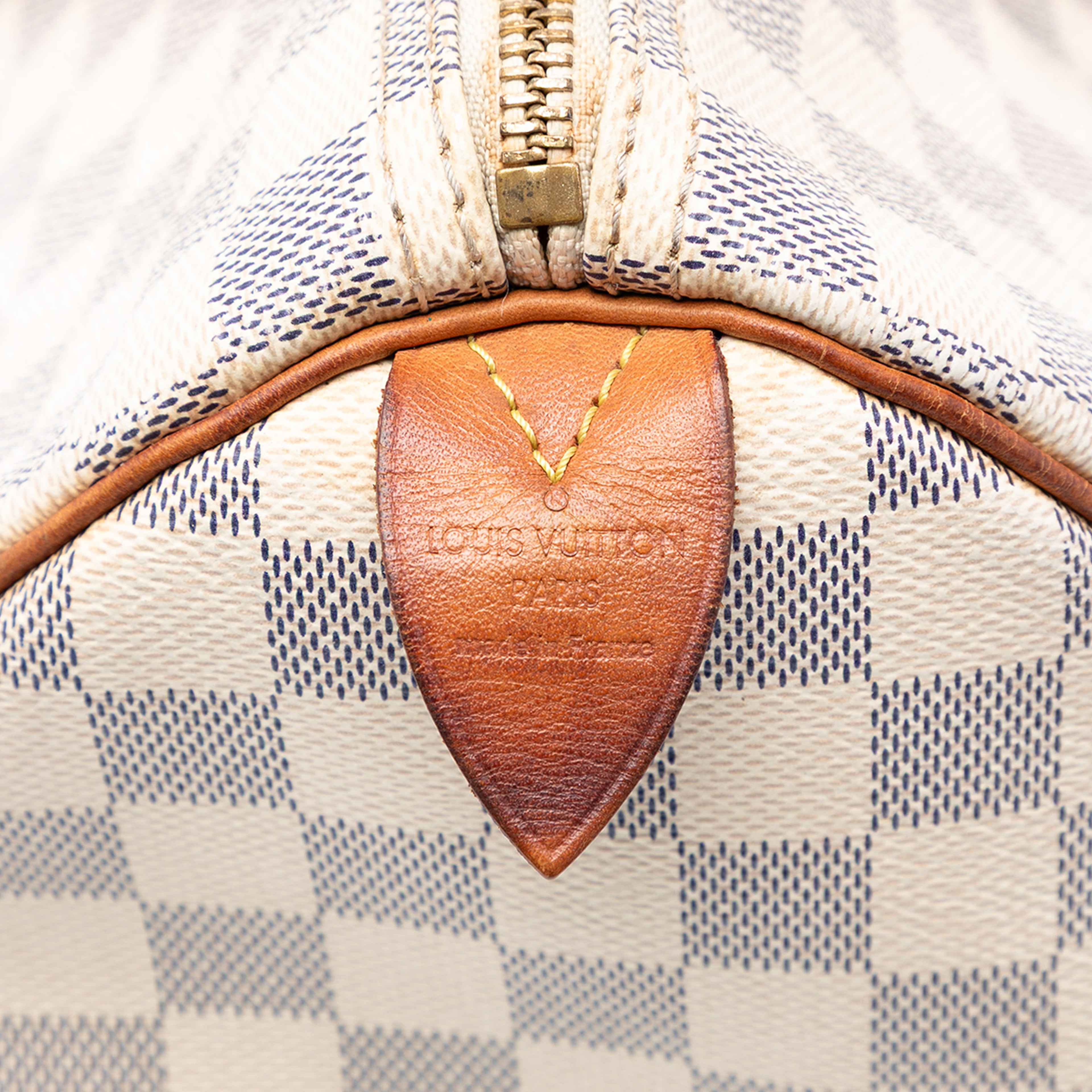 Louis Vuitton Damier Azur Speedy 35, från Luxclusif, i färgen white. Klicka för att öppna bilden i stort format