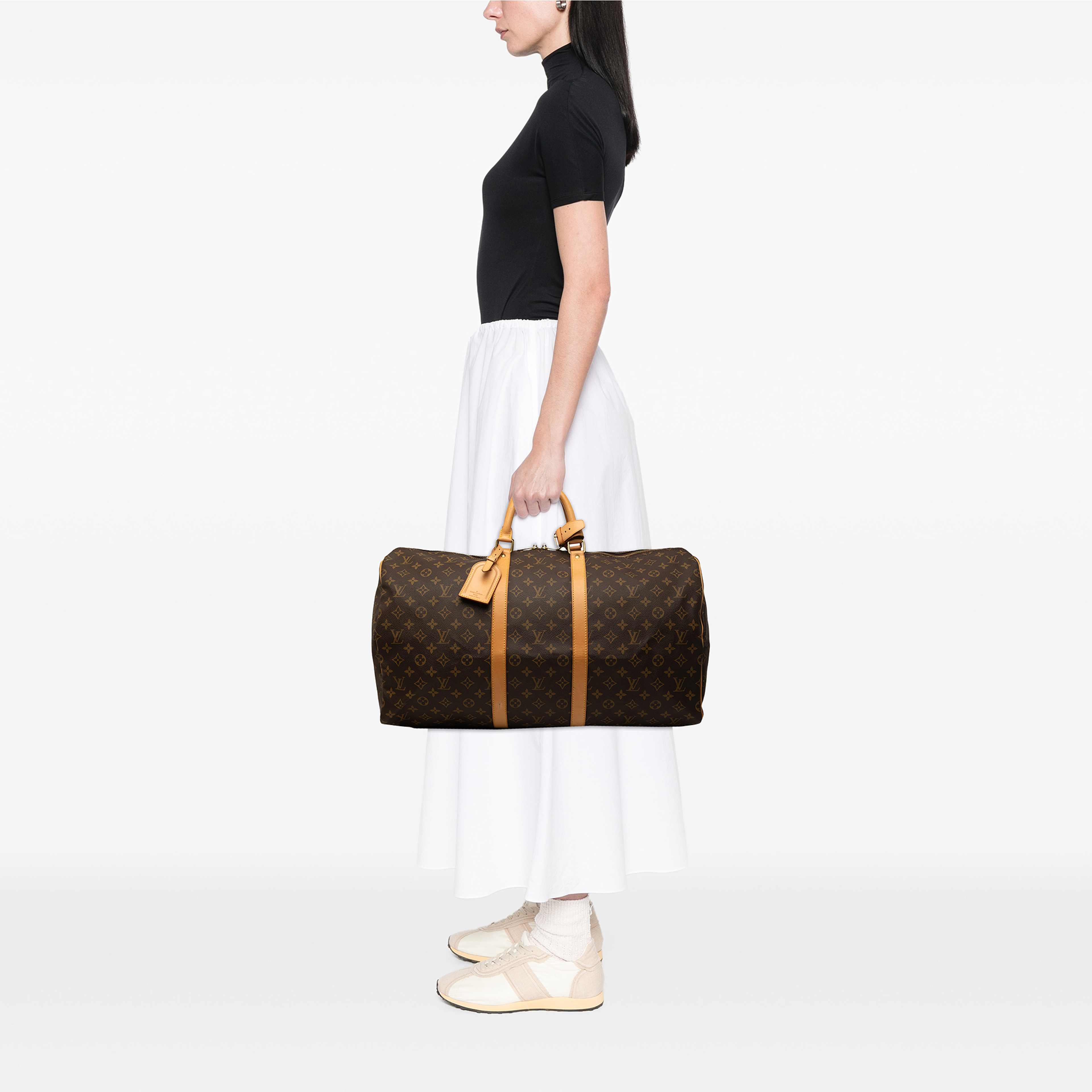 Louis Vuitton Monogram Keepall 55, från Luxclusif, i färgen brun. Klicka för att öppna bilden i stort format