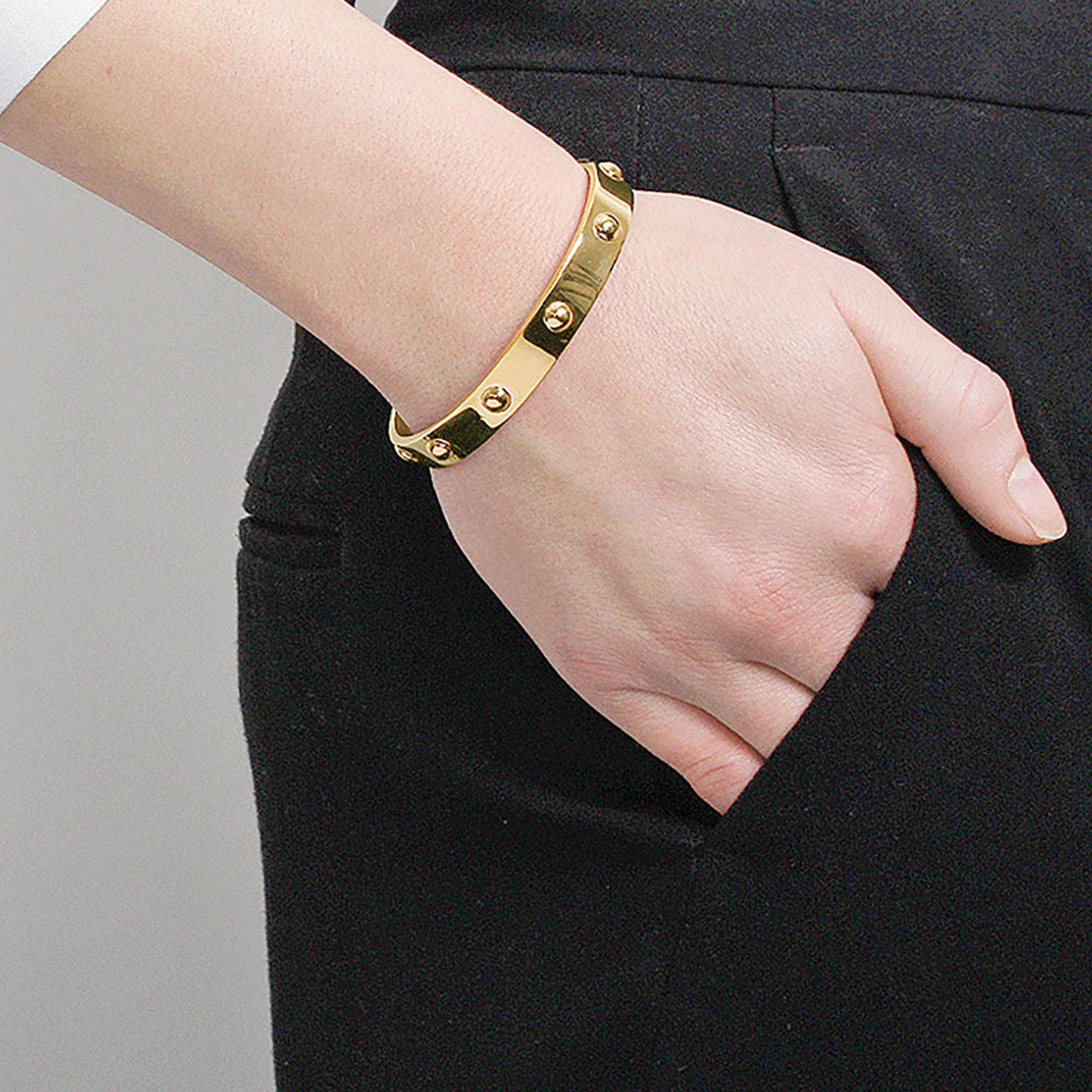 Dott II Shiny Gold, från Dyrberg & Kern, i färgen Gold. Klicka för att öppna bilden i stort format