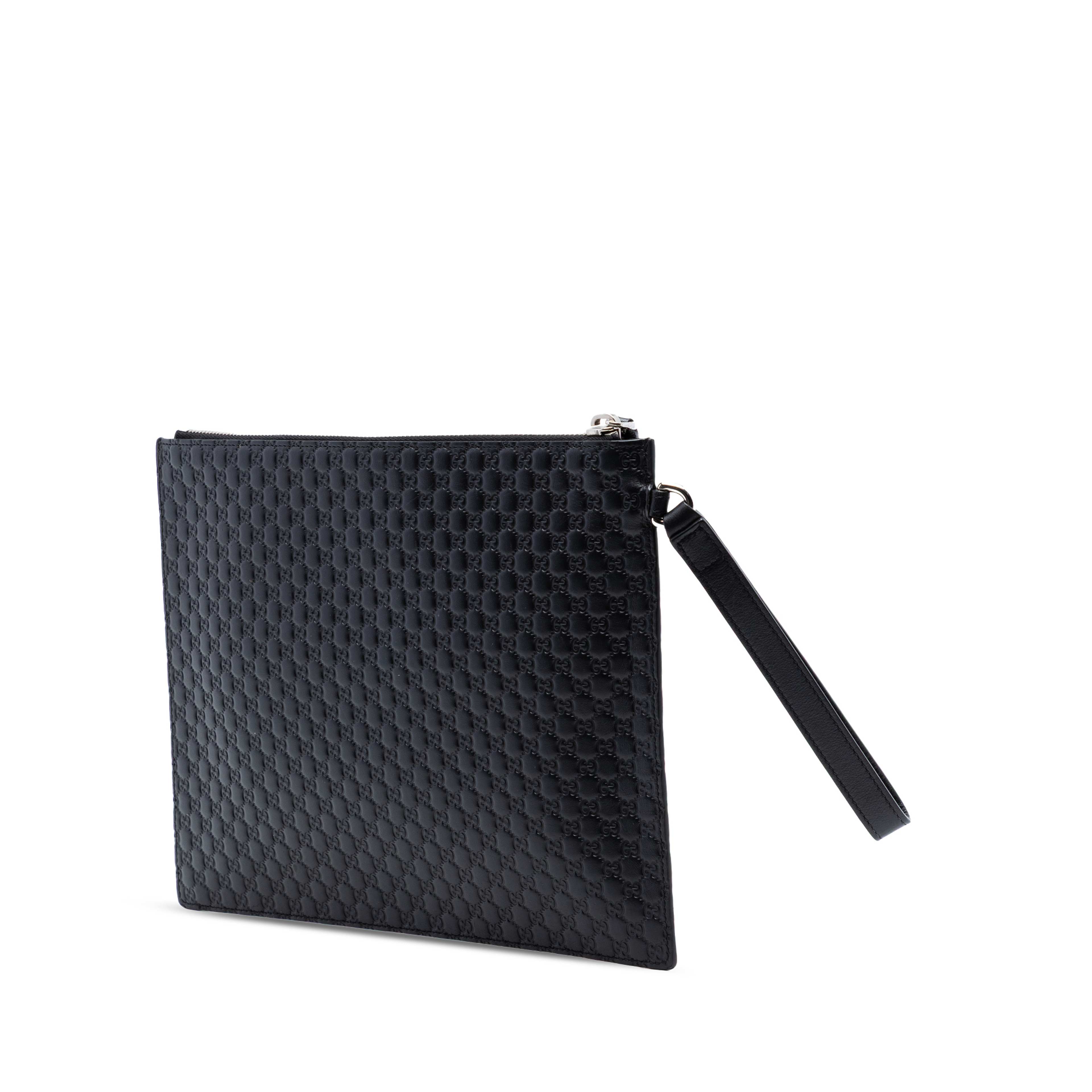 Gucci Microguccissima Clutch, från Luxclusif, i färgen black. Klicka för att öppna bilden i stort format