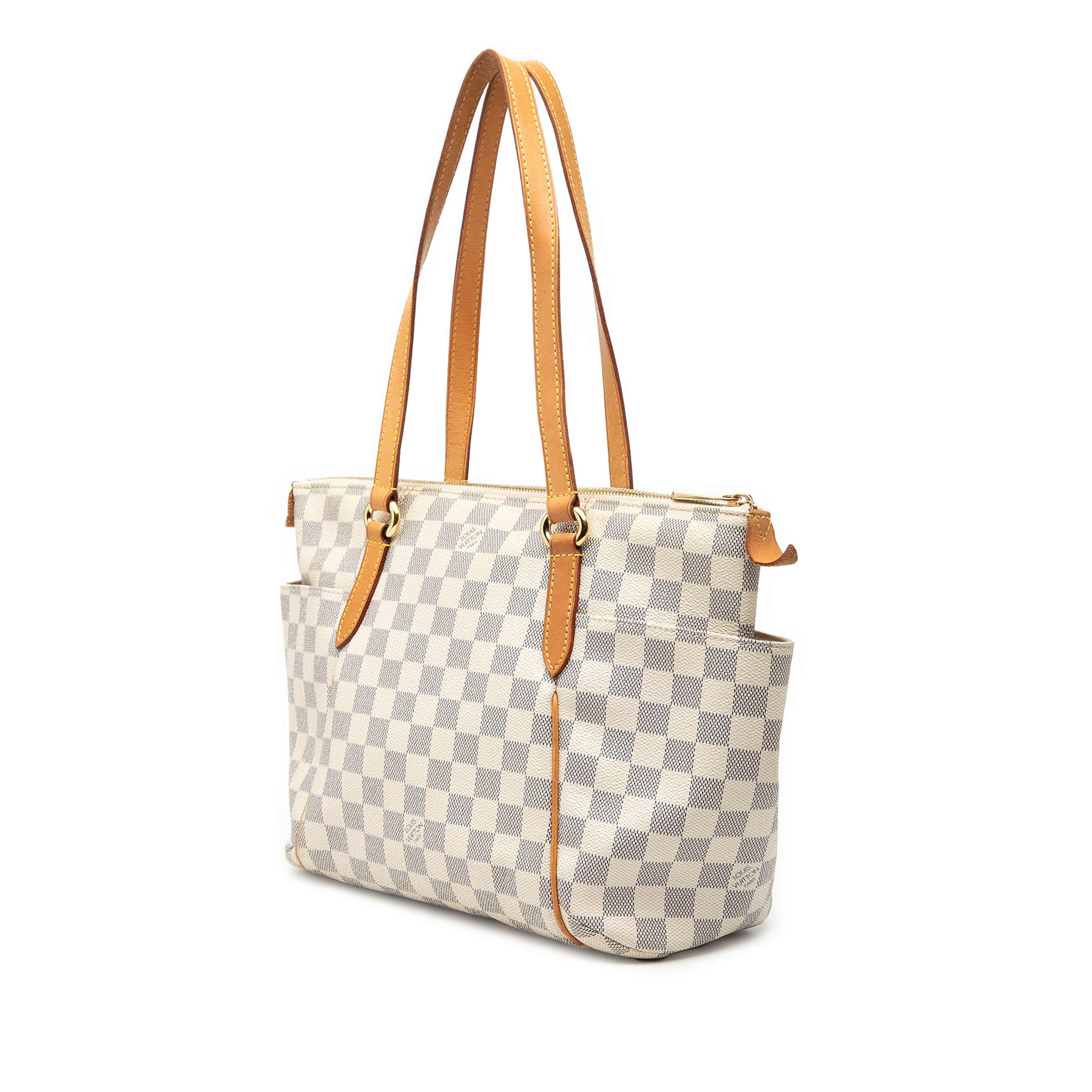Louis Vuitton Damier Azur Totally Pm, från Luxclusif, i färgen white. Klicka för att öppna bilden i stort format