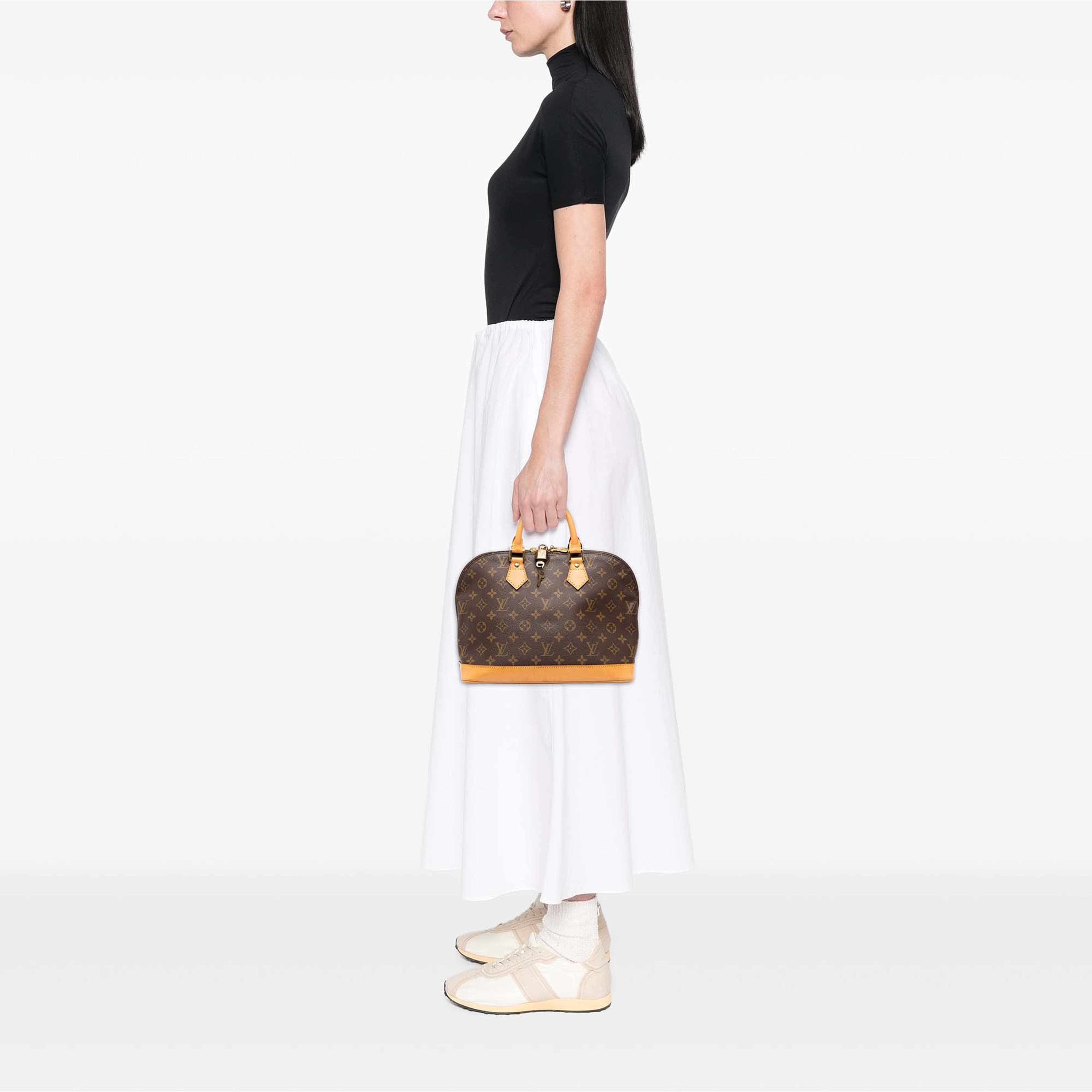 Louis Vuitton Monogram Alma Pm, från Luxclusif, i färgen brun. Klicka för att öppna bilden i stort format