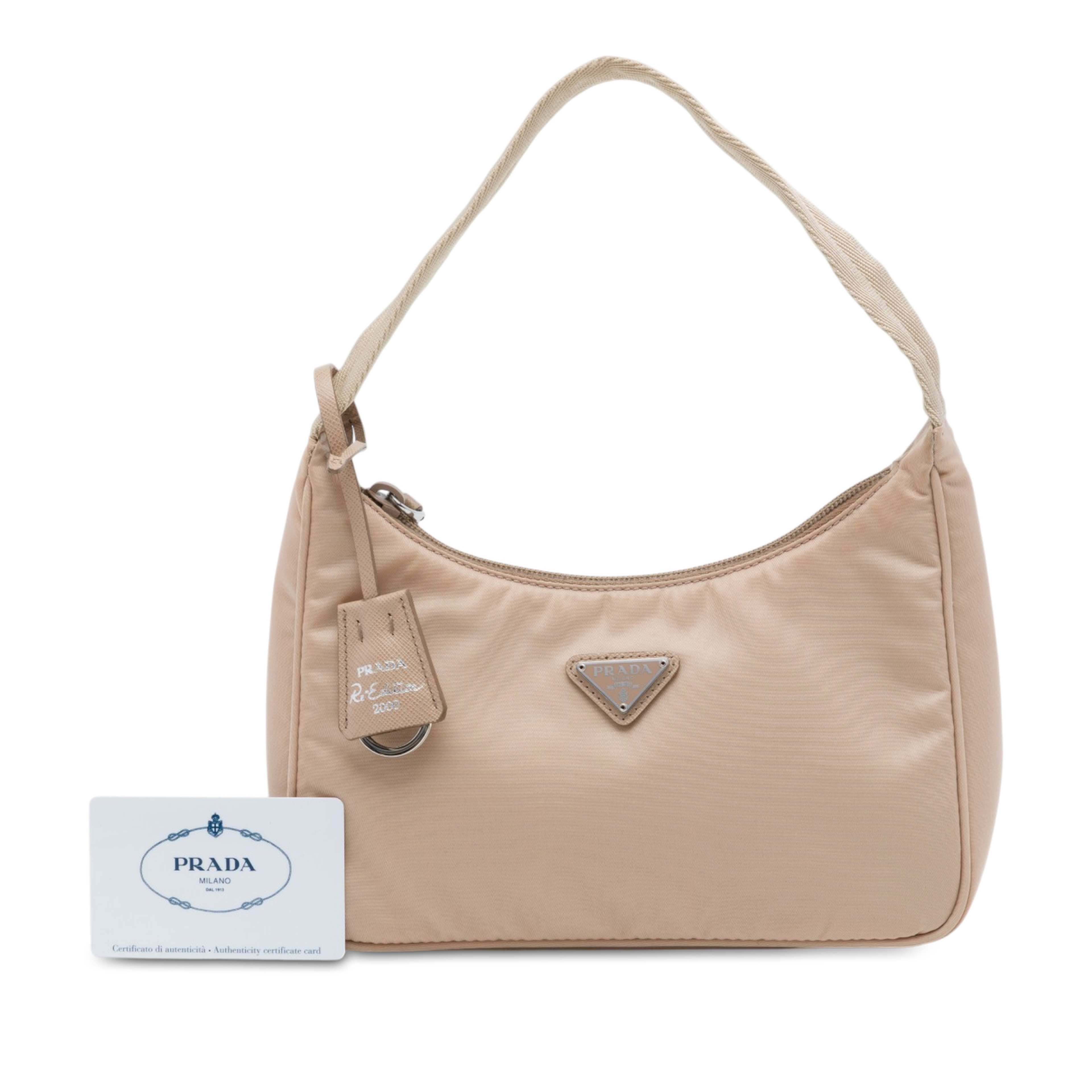 Prada Mini Tessuto Re Edition 2000 Shoulder Bag, från Luxclusif, i färgen beige. Klicka för att öppna bilden i stort format
