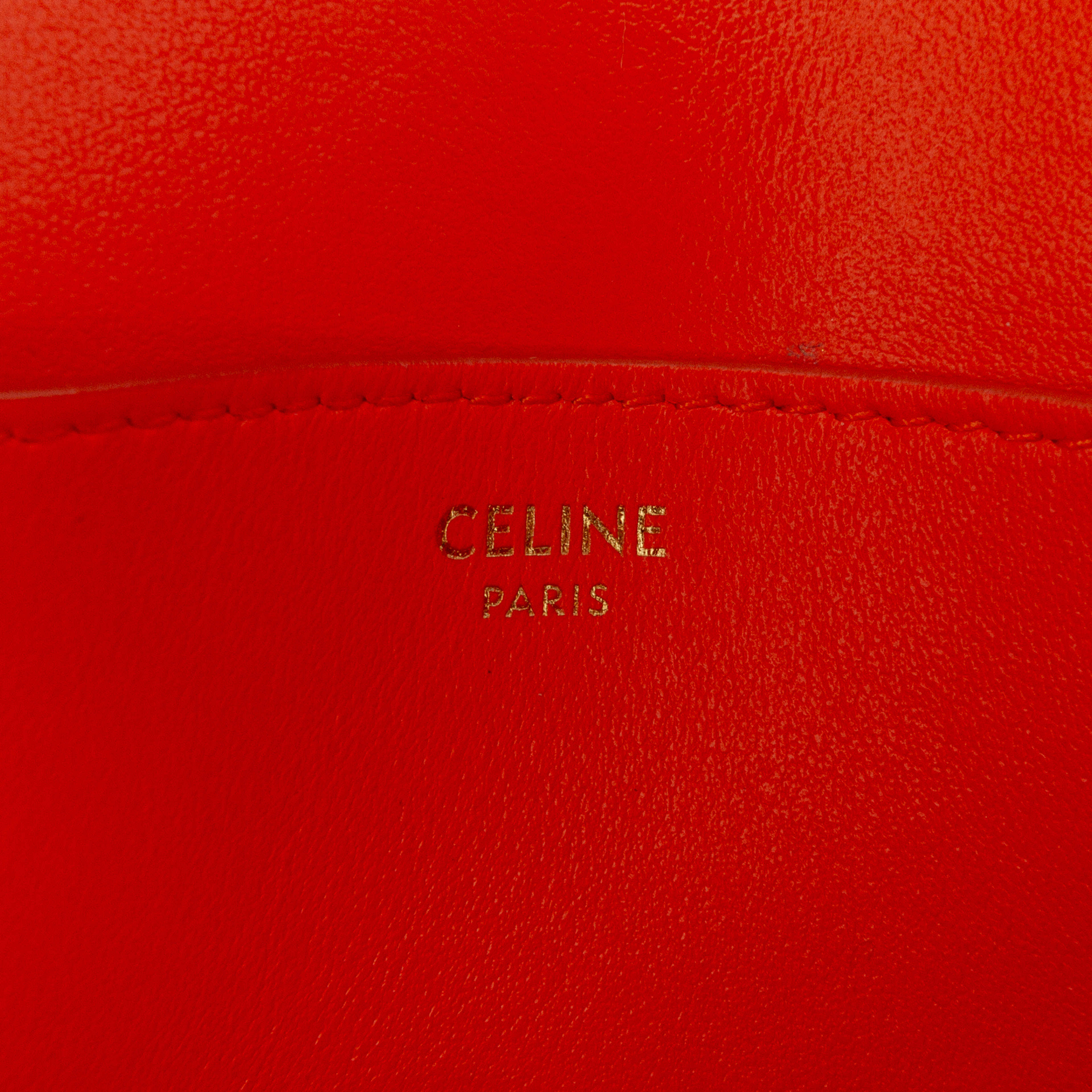 Celine Smooth Calfskin Tabou Clutch On Strap, från Luxclusif, i färgen orange. Klicka för att öppna bilden i stort format