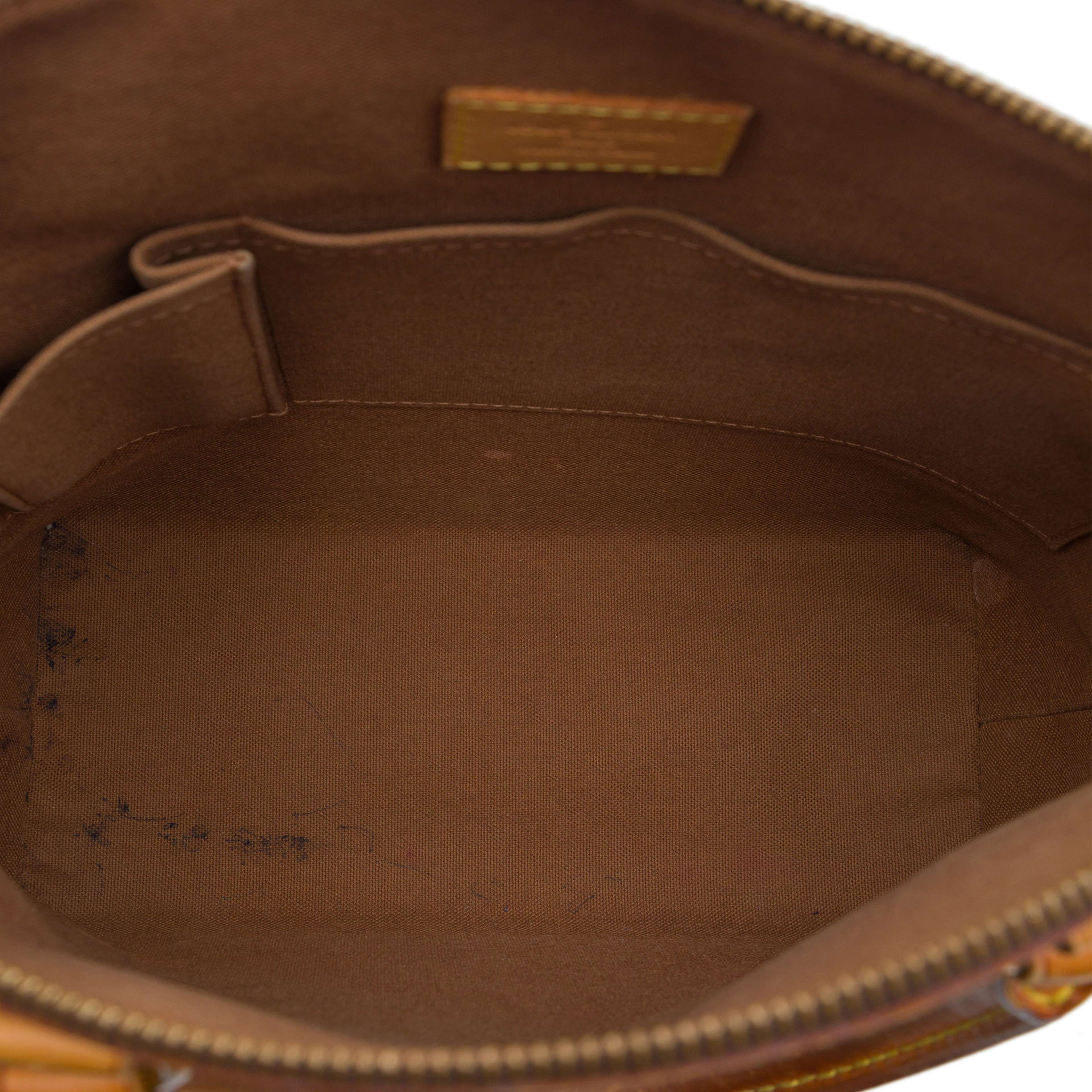 Louis Vuitton Monogram Lockit Pm, från Luxclusif, i färgen brun. Klicka för att öppna bilden i stort format