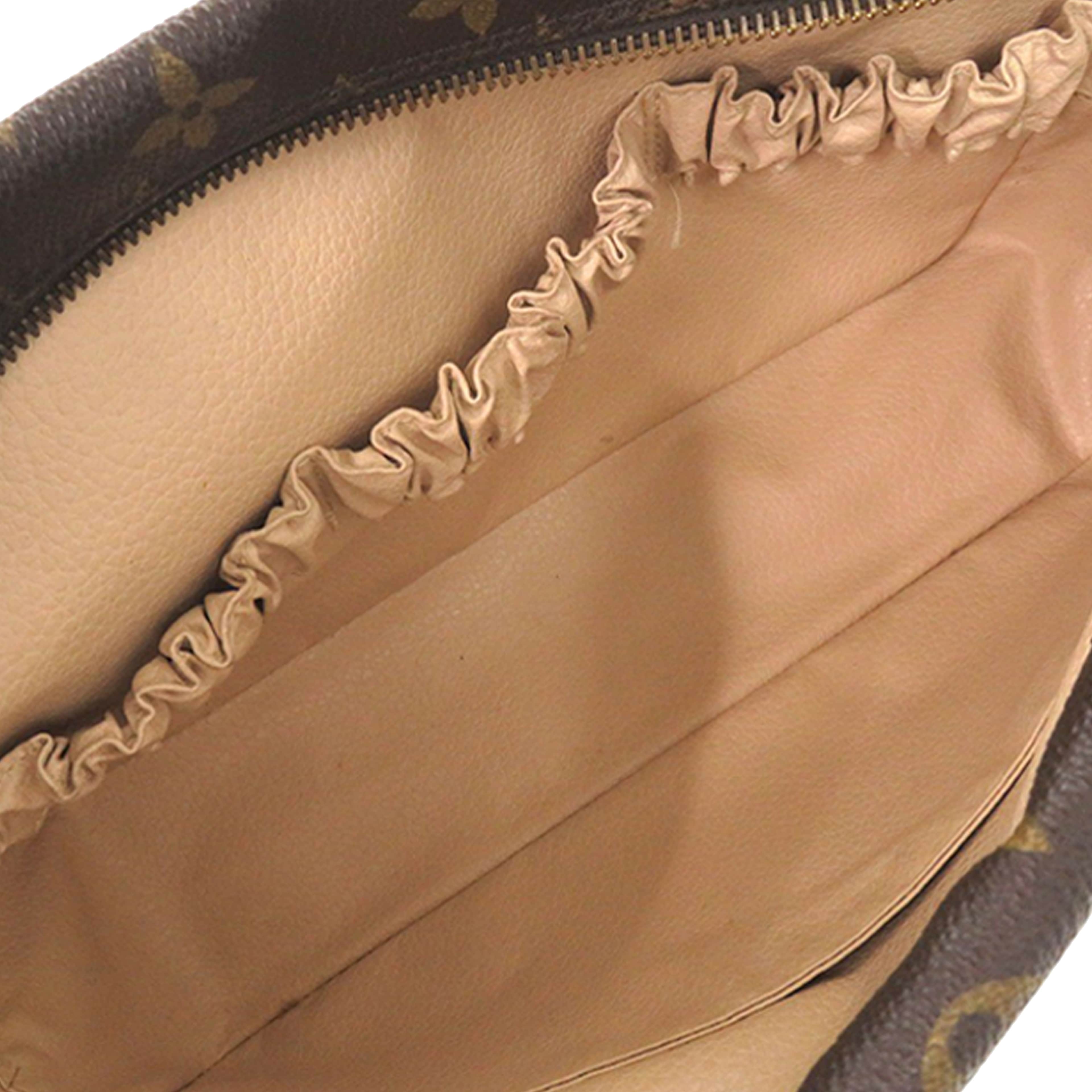 Louis Vuitton Monogram Trousse Toilette 28, från Luxclusif, i färgen brown. Klicka för att öppna bilden i stort format