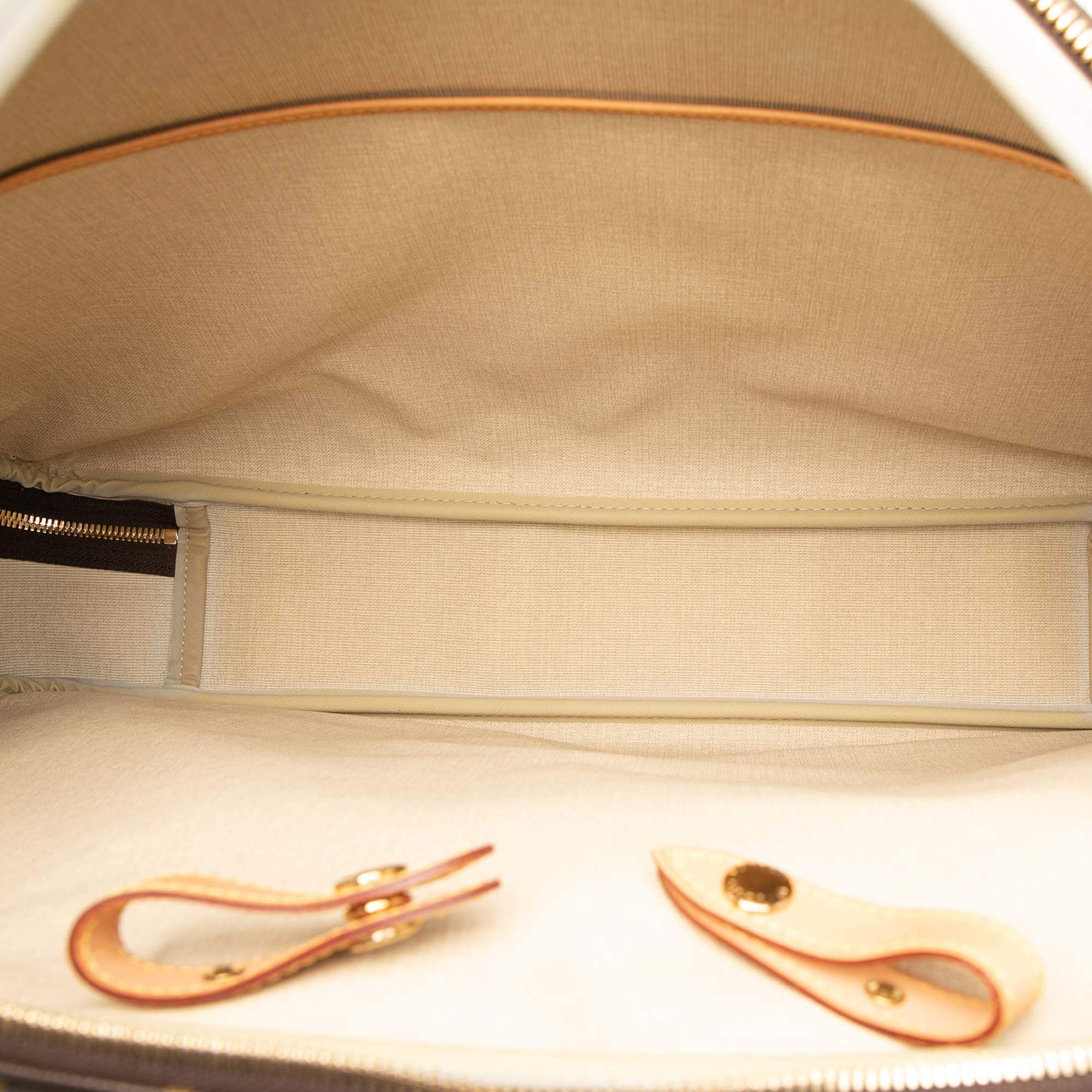 Louis Vuitton Monogram Alize 3 Poches, från Luxclusif, i färgen brown. Klicka för att öppna bilden i stort format