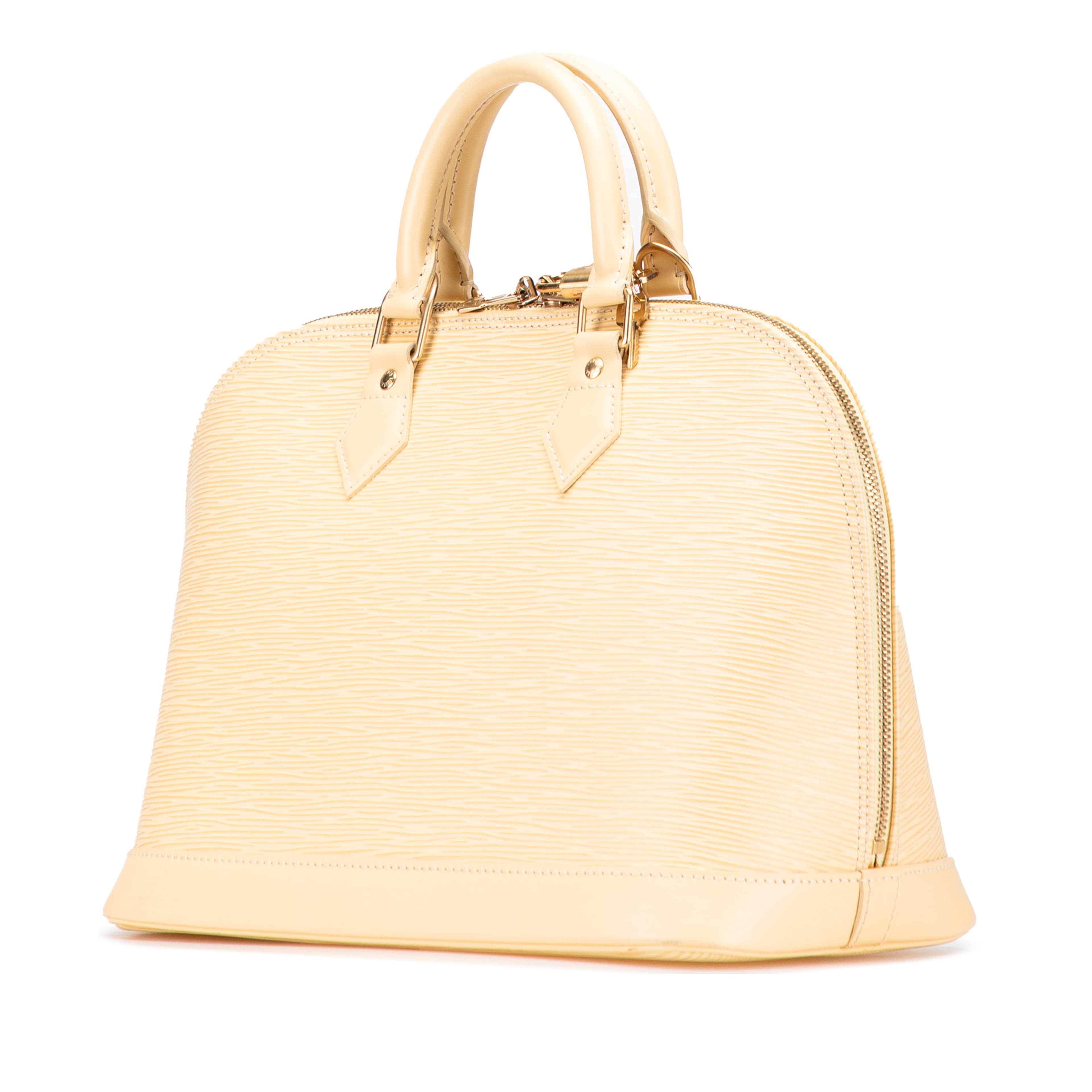 Louis Vuitton Epi Alma Pm, från Luxclusif, i färgen beige. Klicka för att öppna bilden i stort format