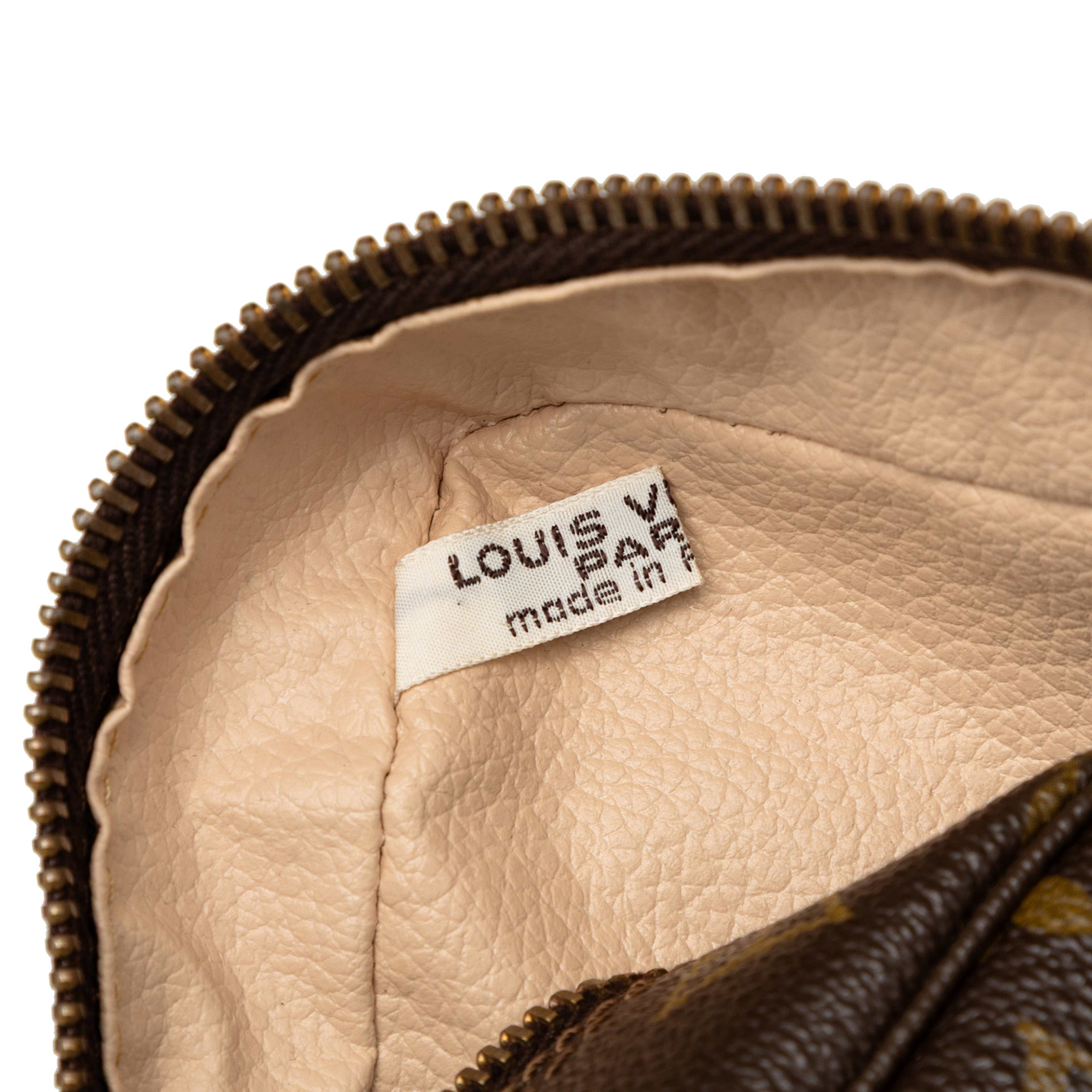 Louis Vuitton Monogram Trousse Toilette 28, från Luxclusif, i färgen brun. Klicka för att öppna bilden i stort format