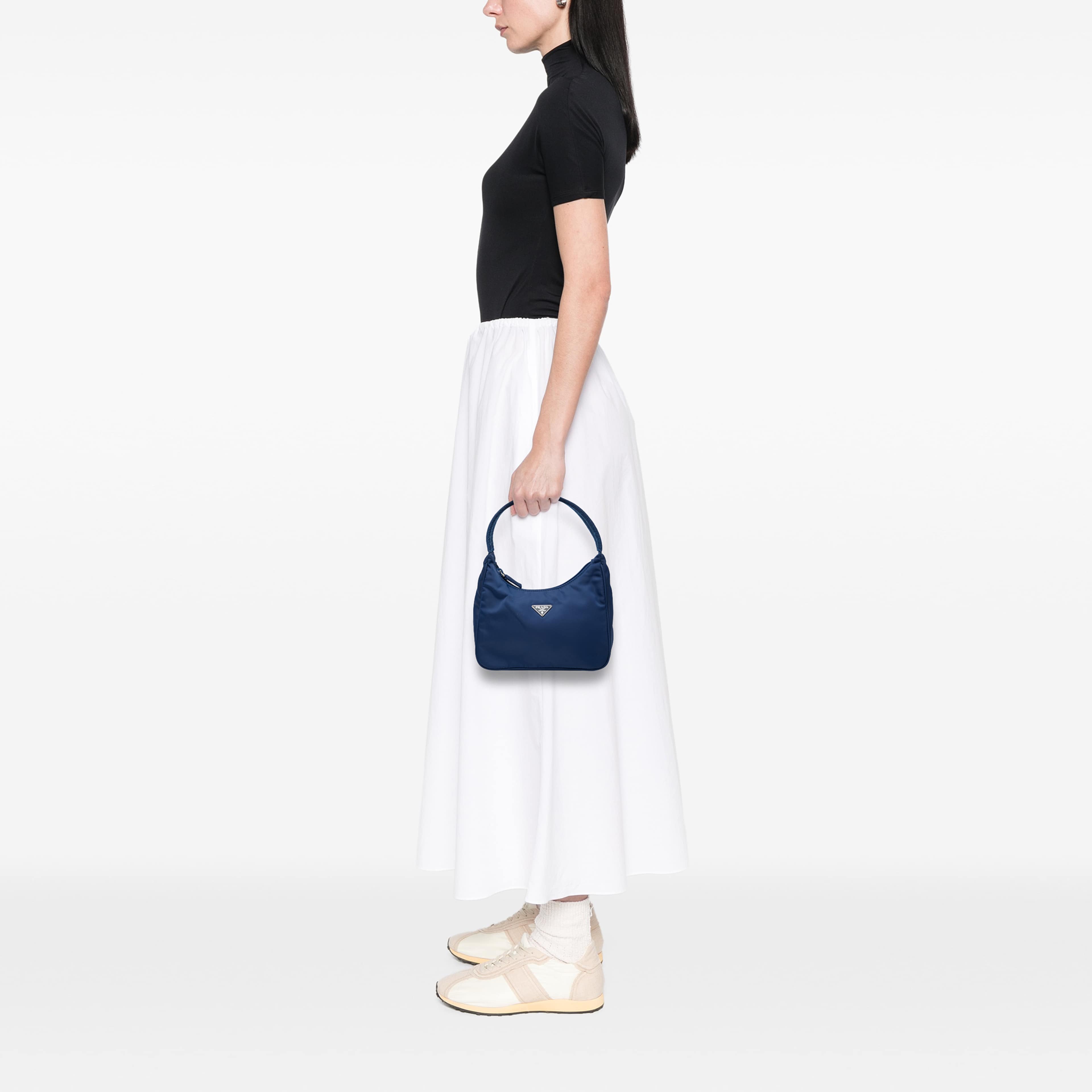 Prada Mini Tessuto Sport Shoulder Bag, från Luxclusif, i färgen blå. Klicka för att öppna bilden i stort format