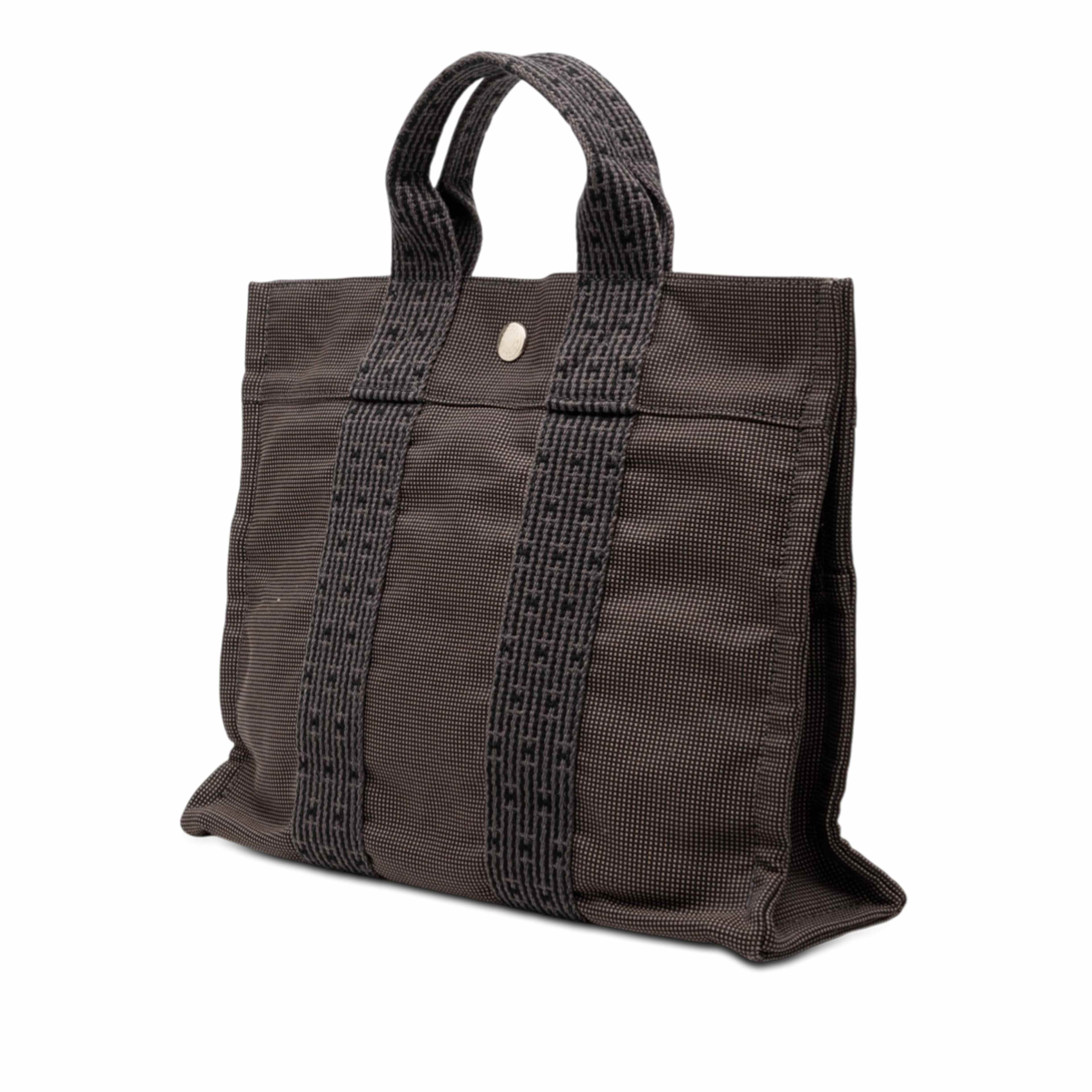 Hermès Canvas Herline Pm, från Luxclusif, i färgen dark gray. Klicka för att öppna bilden i stort format