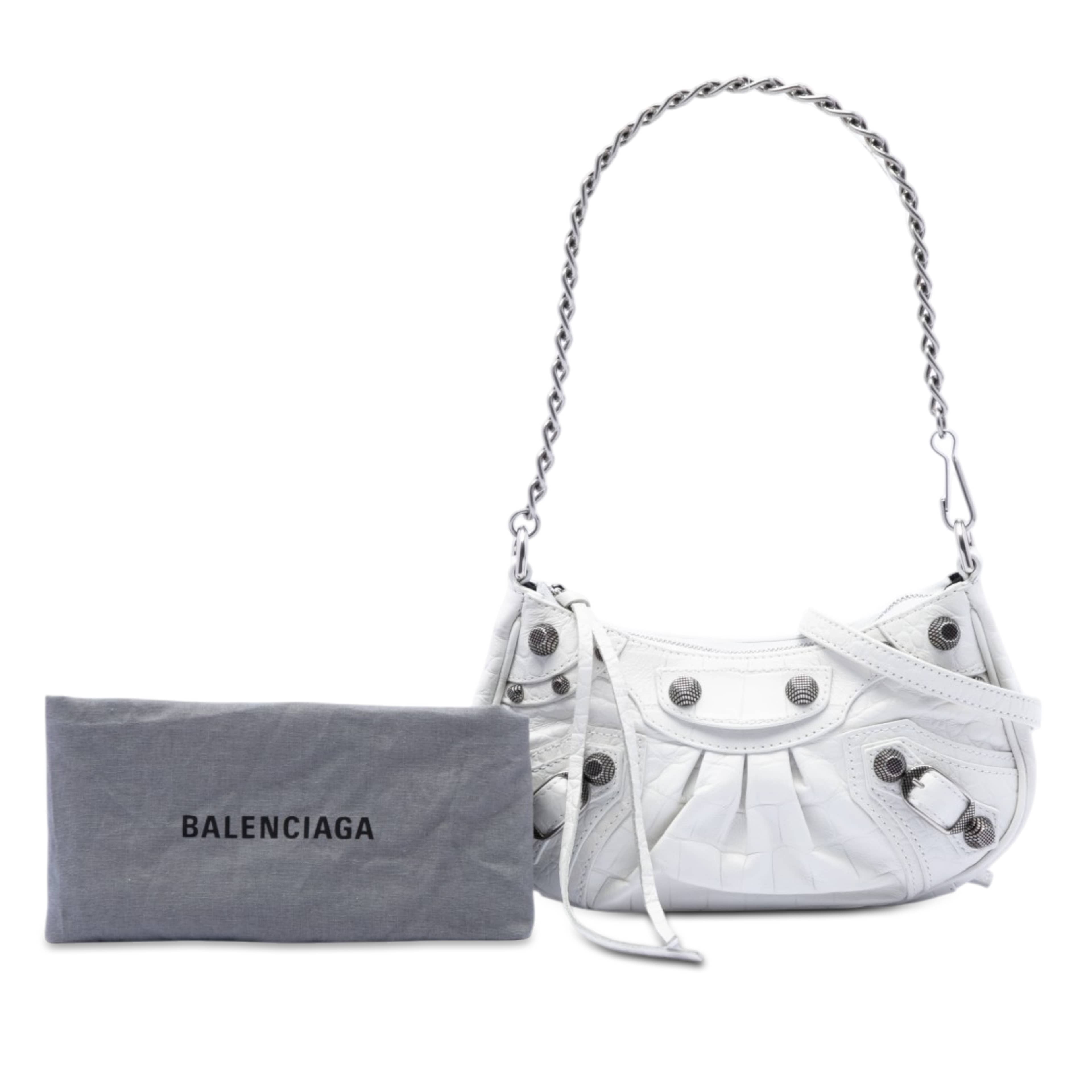 Balenciaga Mini Embossed Leather Motocross Le Cagole, från Luxclusif, i färgen vit. Klicka för att öppna bilden i stort format