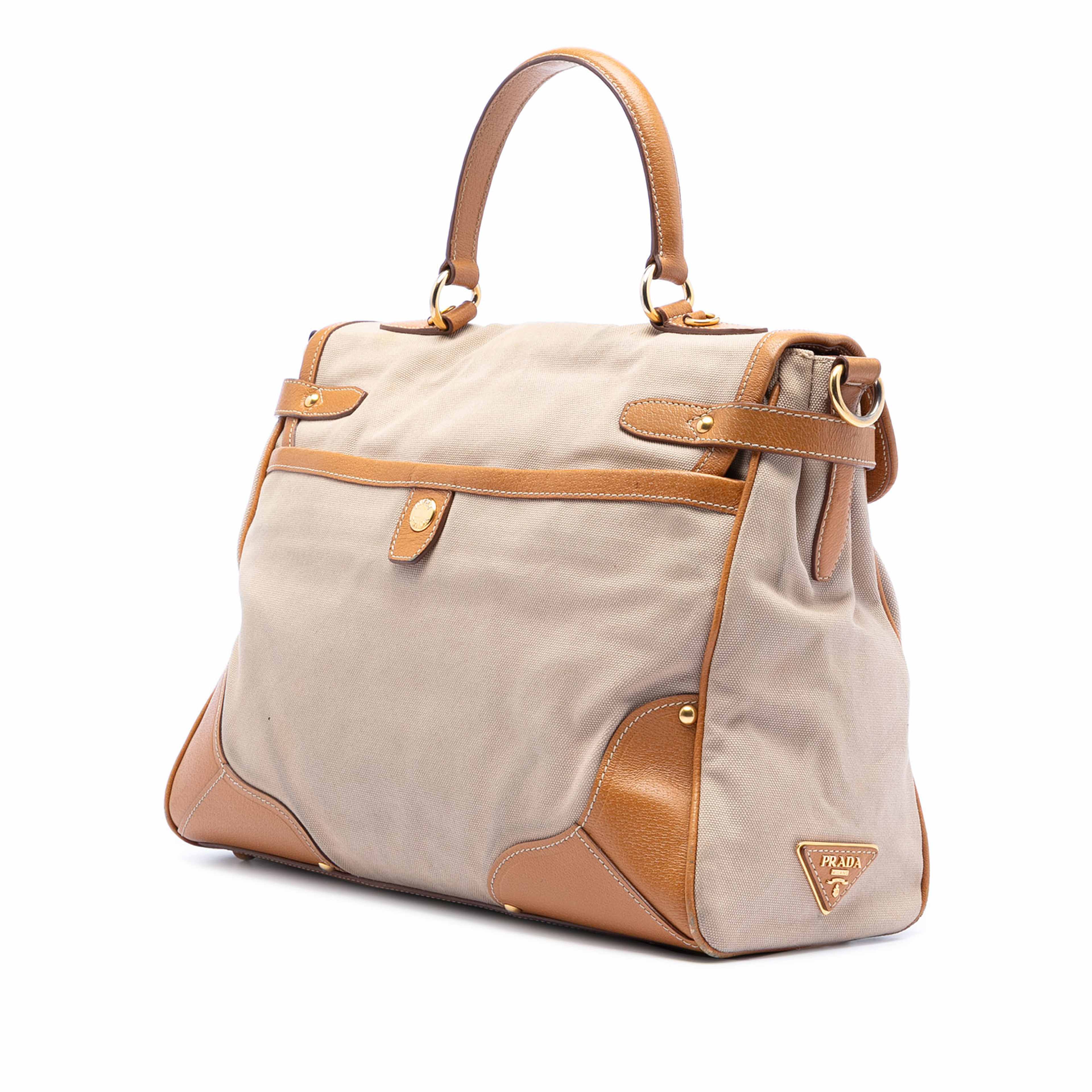 Prada Cinghiale Trimmed Canapa Top Handle Bag, från Luxclusif, i färgen beige. Klicka för att öppna bilden i stort format