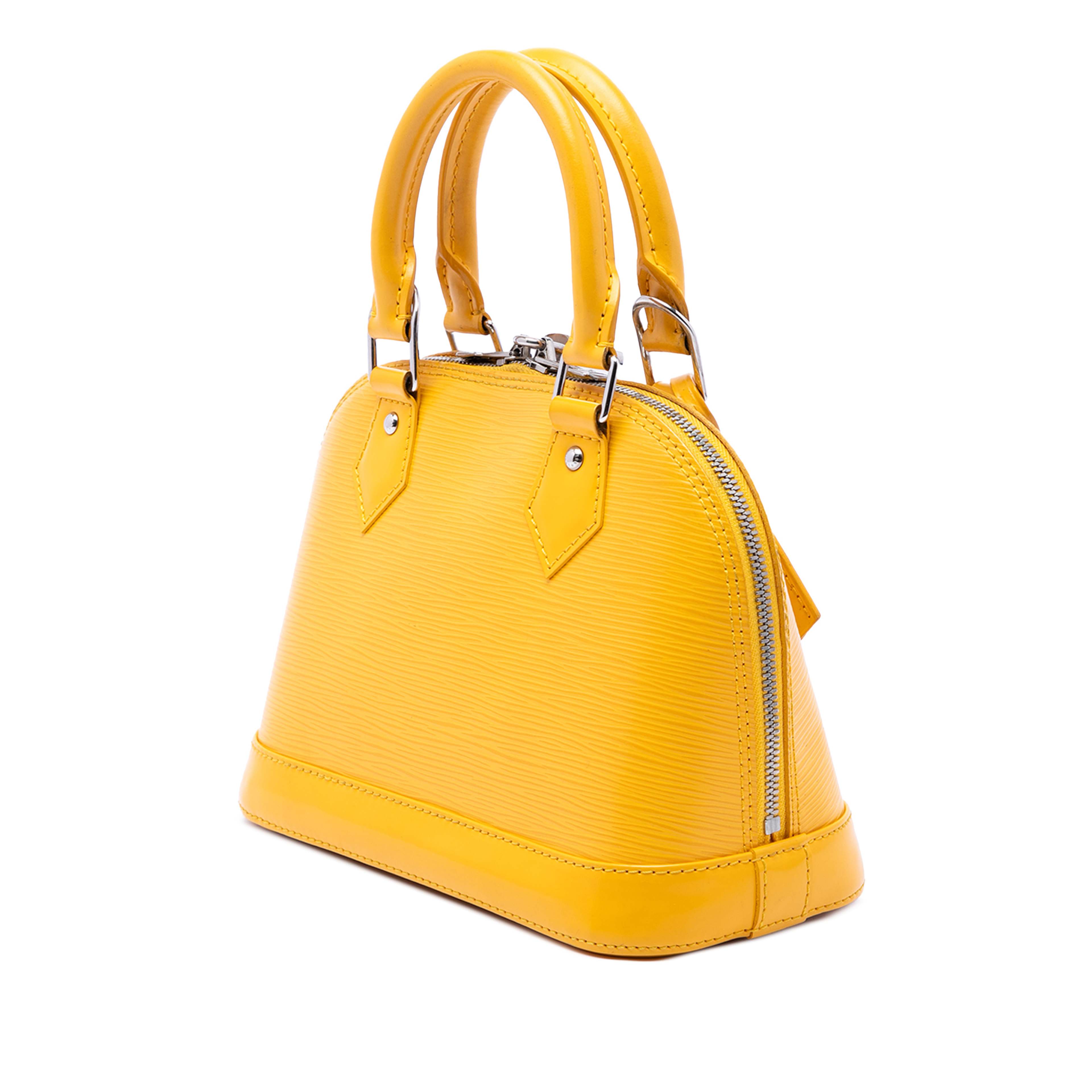 Louis Vuitton Epi Alma Bb, från Luxclusif, i färgen gul. Klicka för att öppna bilden i stort format