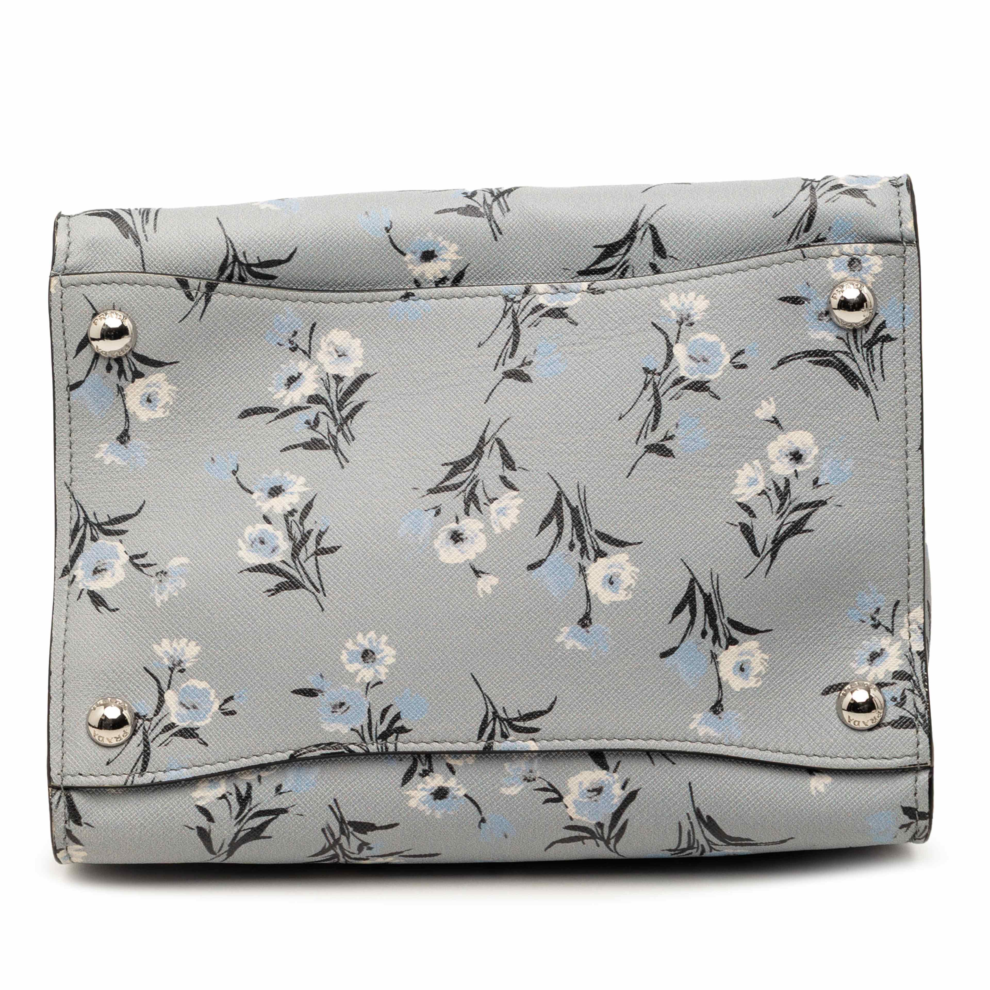 Prada Saffiano Floral Print Twin Pocket Satchel, från Luxclusif, i färgen grå. Klicka för att öppna bilden i stort format